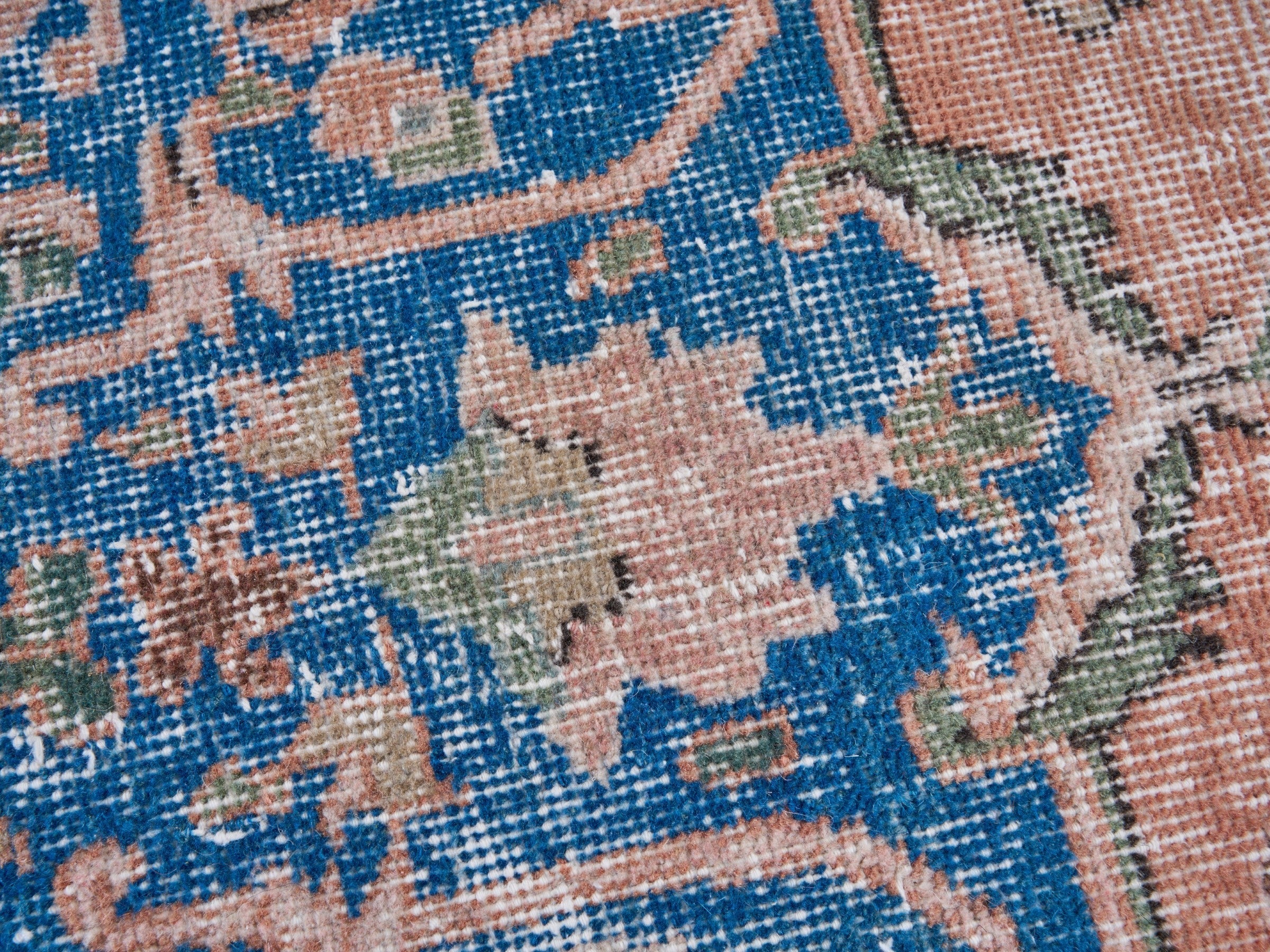 Turkish Isparta area rug in terracotta and navy, view 7 of 10