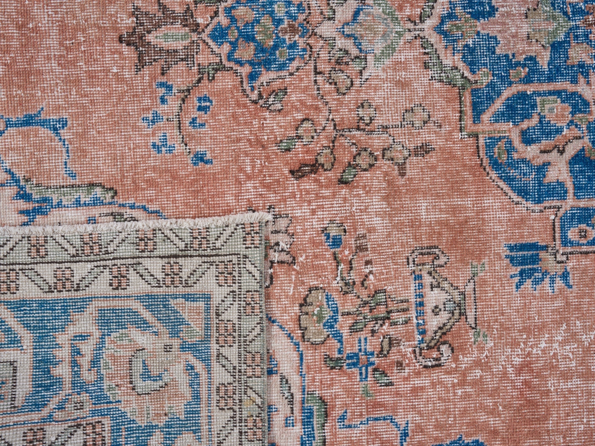Turkish Isparta area rug in terracotta and navy, view 10 of 10