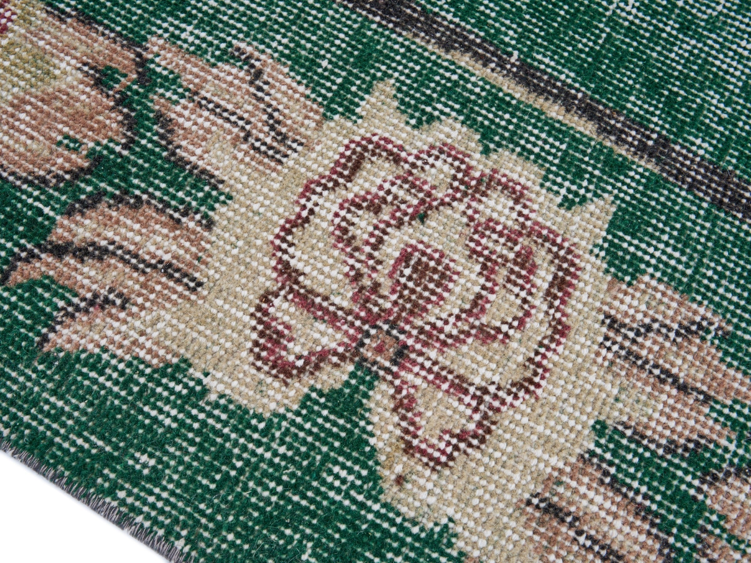 Turkish Isparta area rug in forest and muted pink, view 6 of 10