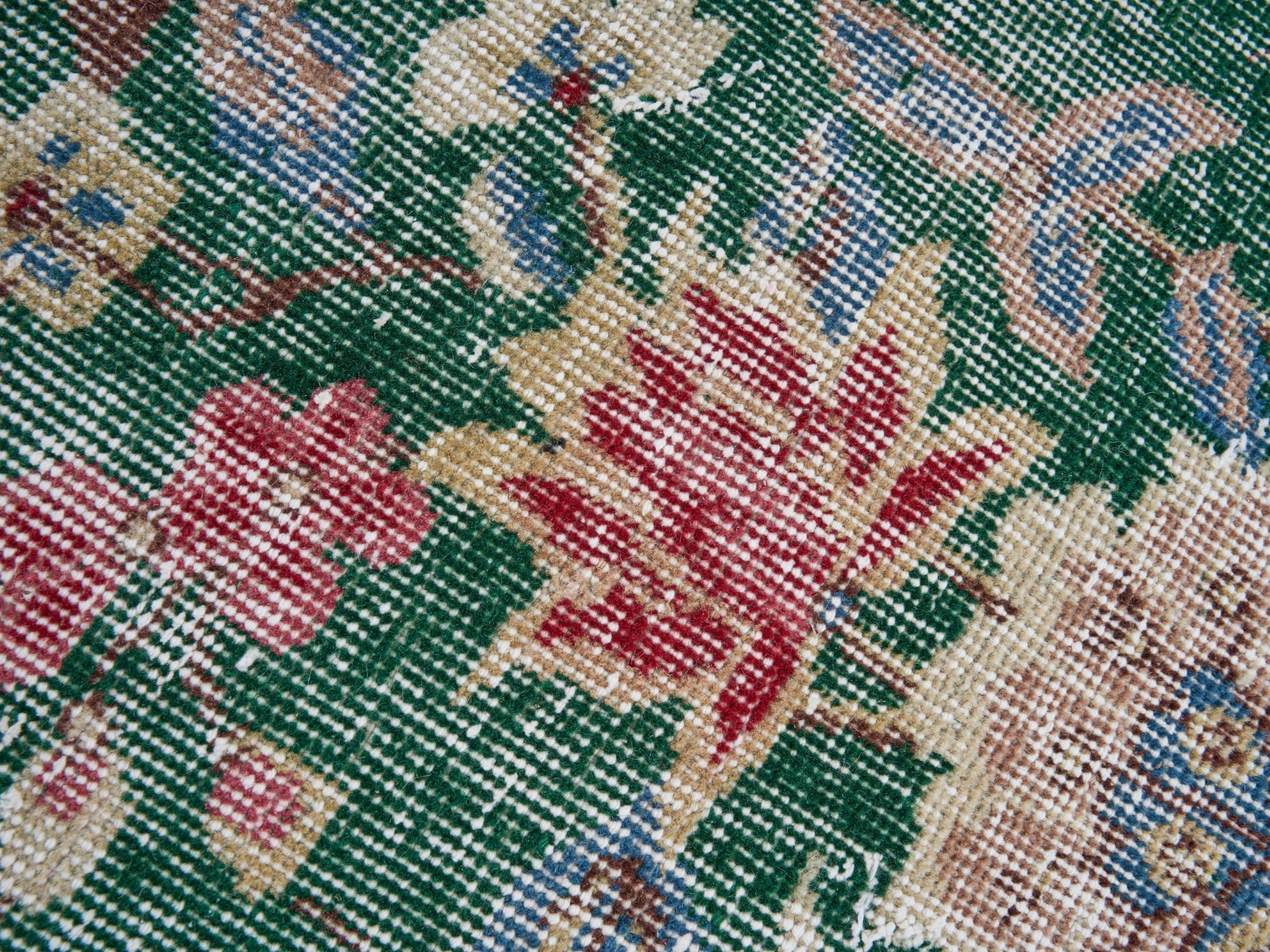 Turkish Isparta area rug in forest and muted pink, view 7 of 10