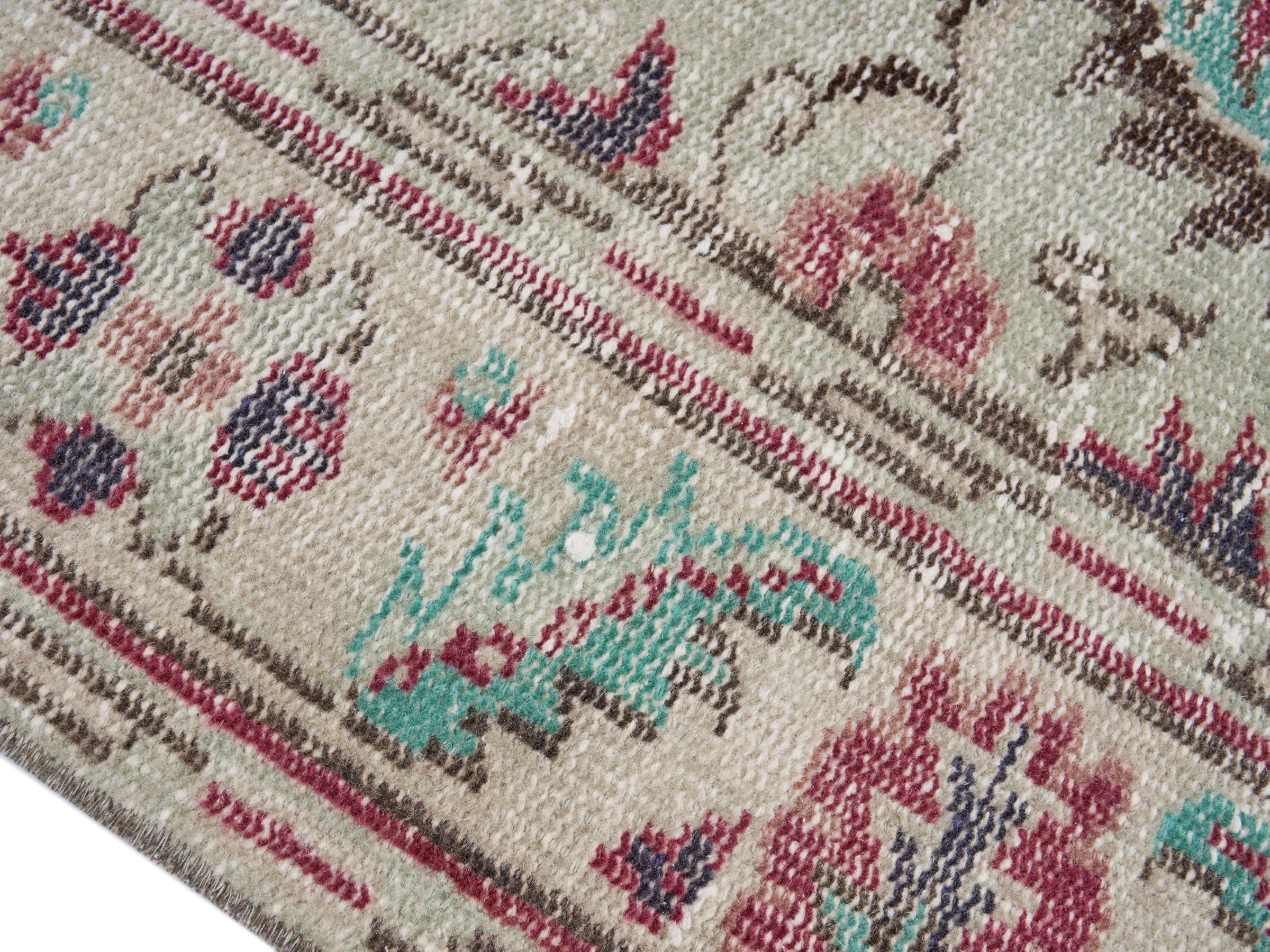 Turkish Manisa area rug in faded red and cream, view 6 of 10