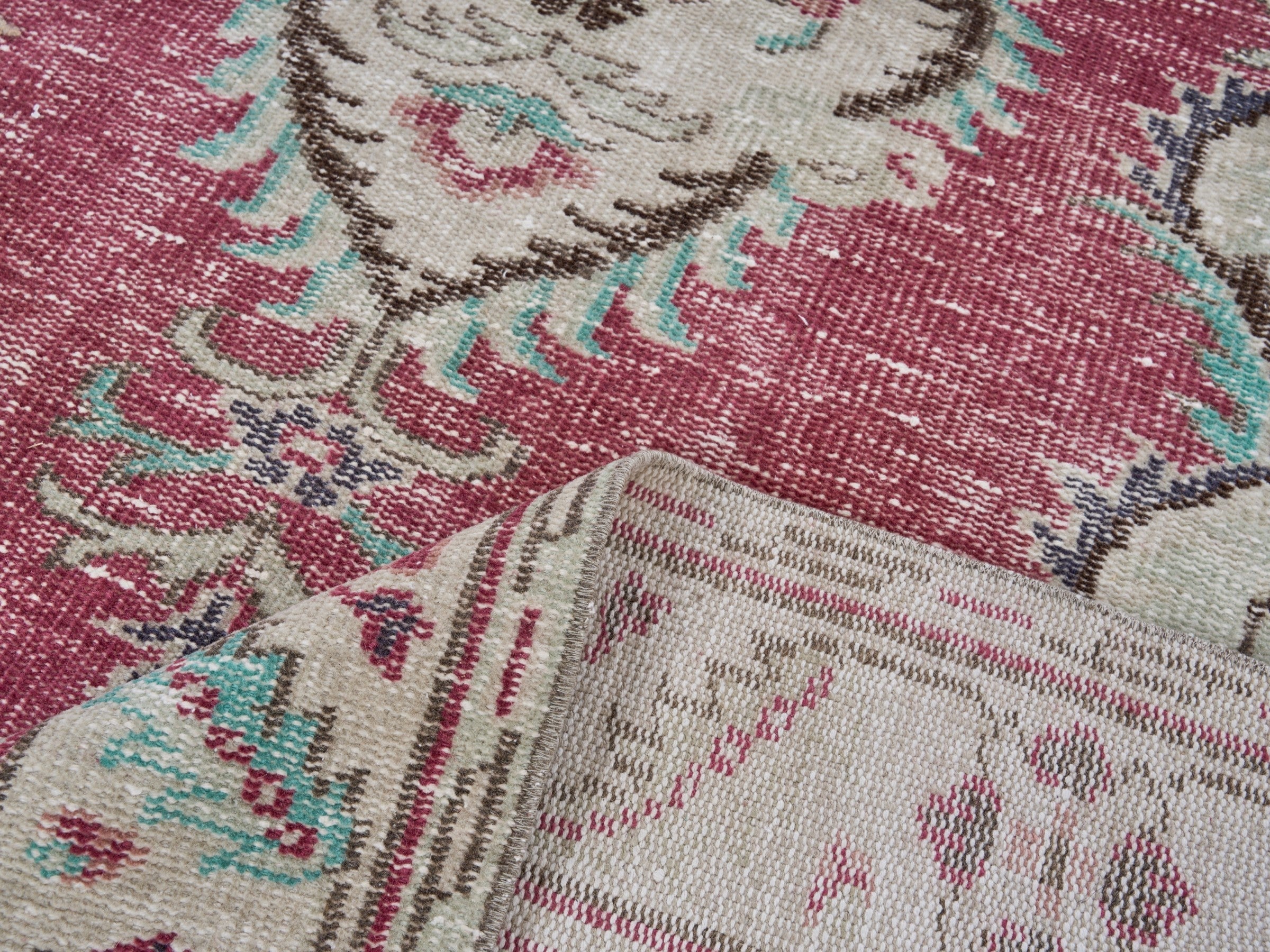 Turkish Manisa area rug in faded red and cream, view 9 of 10