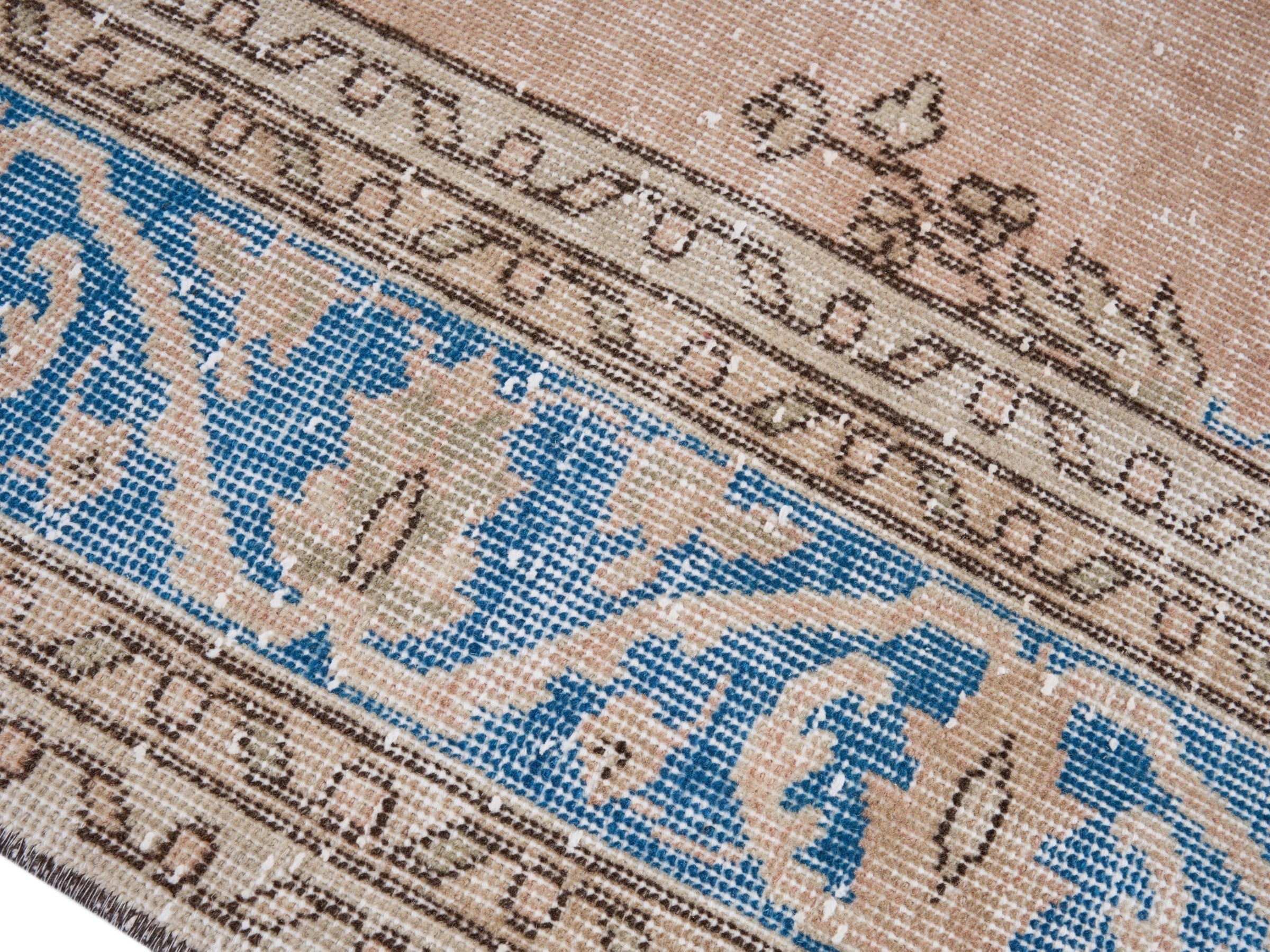 Turkish Isparta area rug in muted pink and denim, view 6 of 10