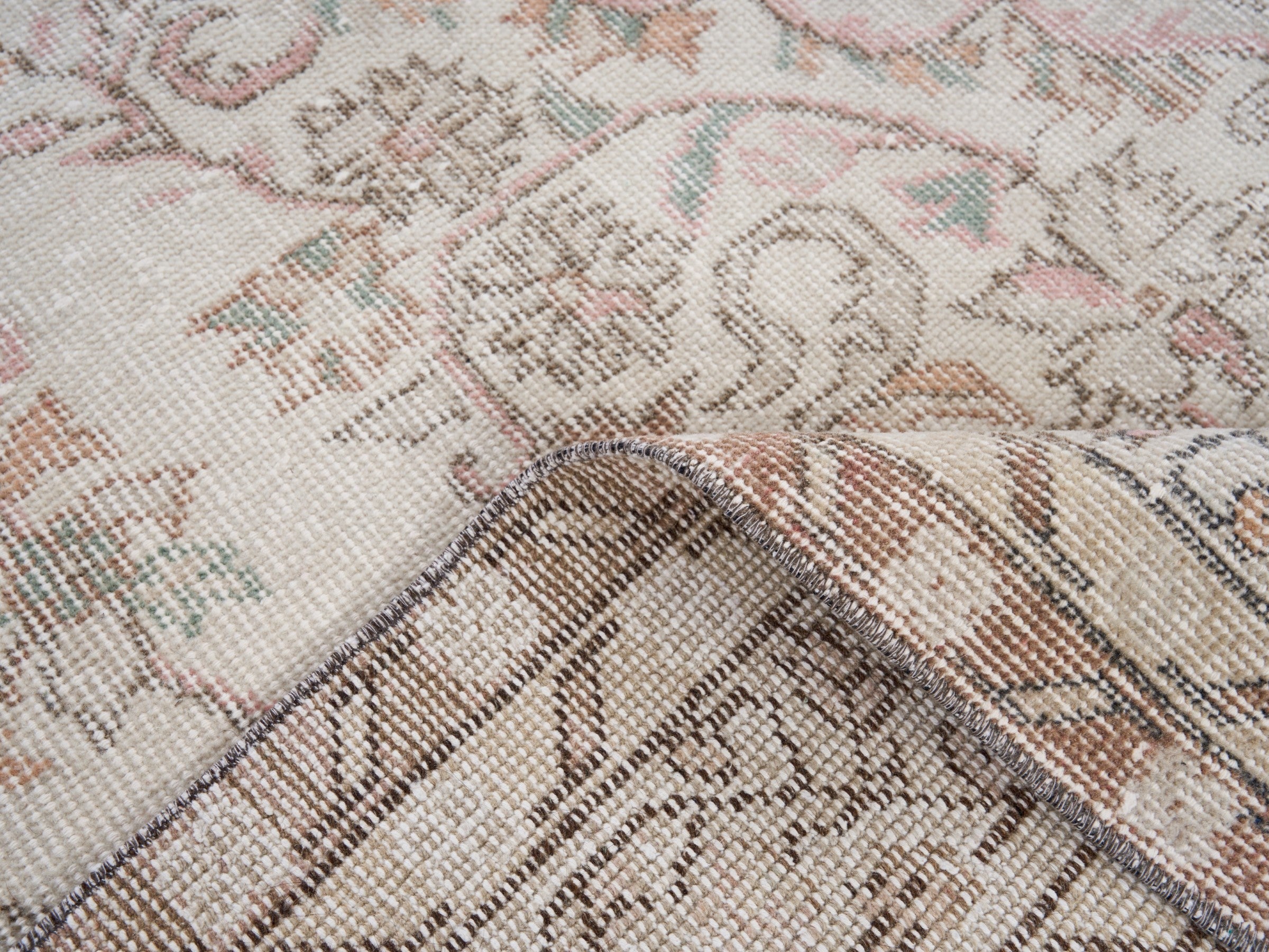 Turkish Isparta area rug in cream and muted pink, view 9 of 10