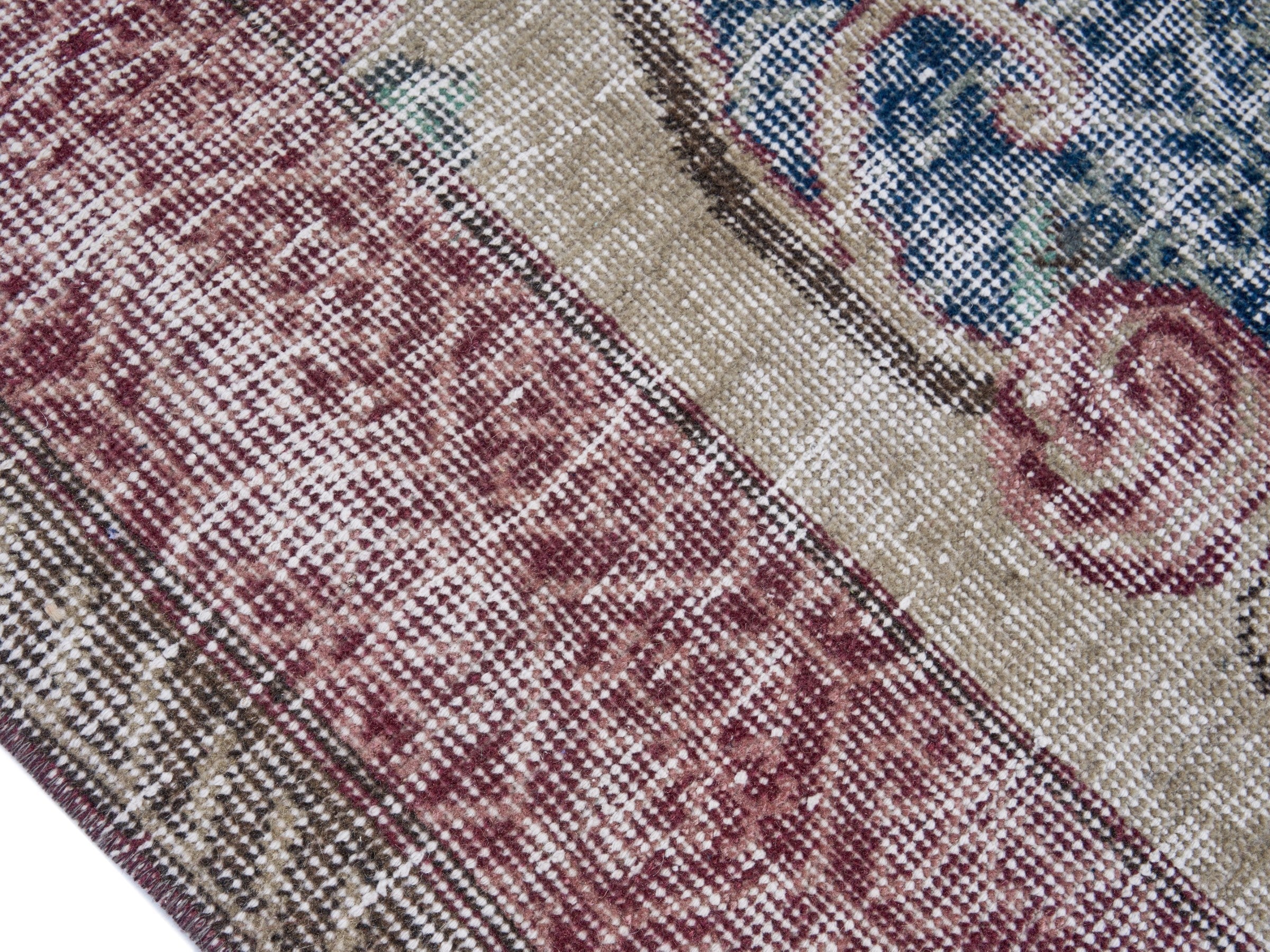 Turkish Isparta area rug in dark blue and burgundy, view 6 of 10