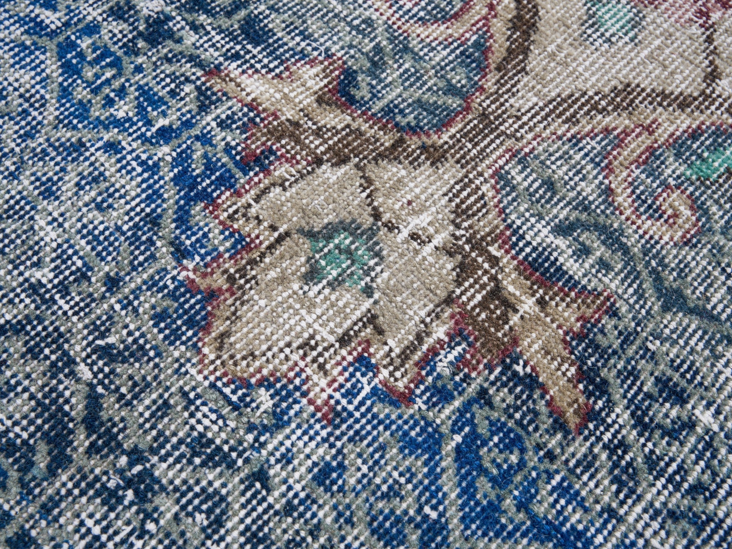 Turkish Isparta area rug in dark blue and burgundy, view 7 of 10
