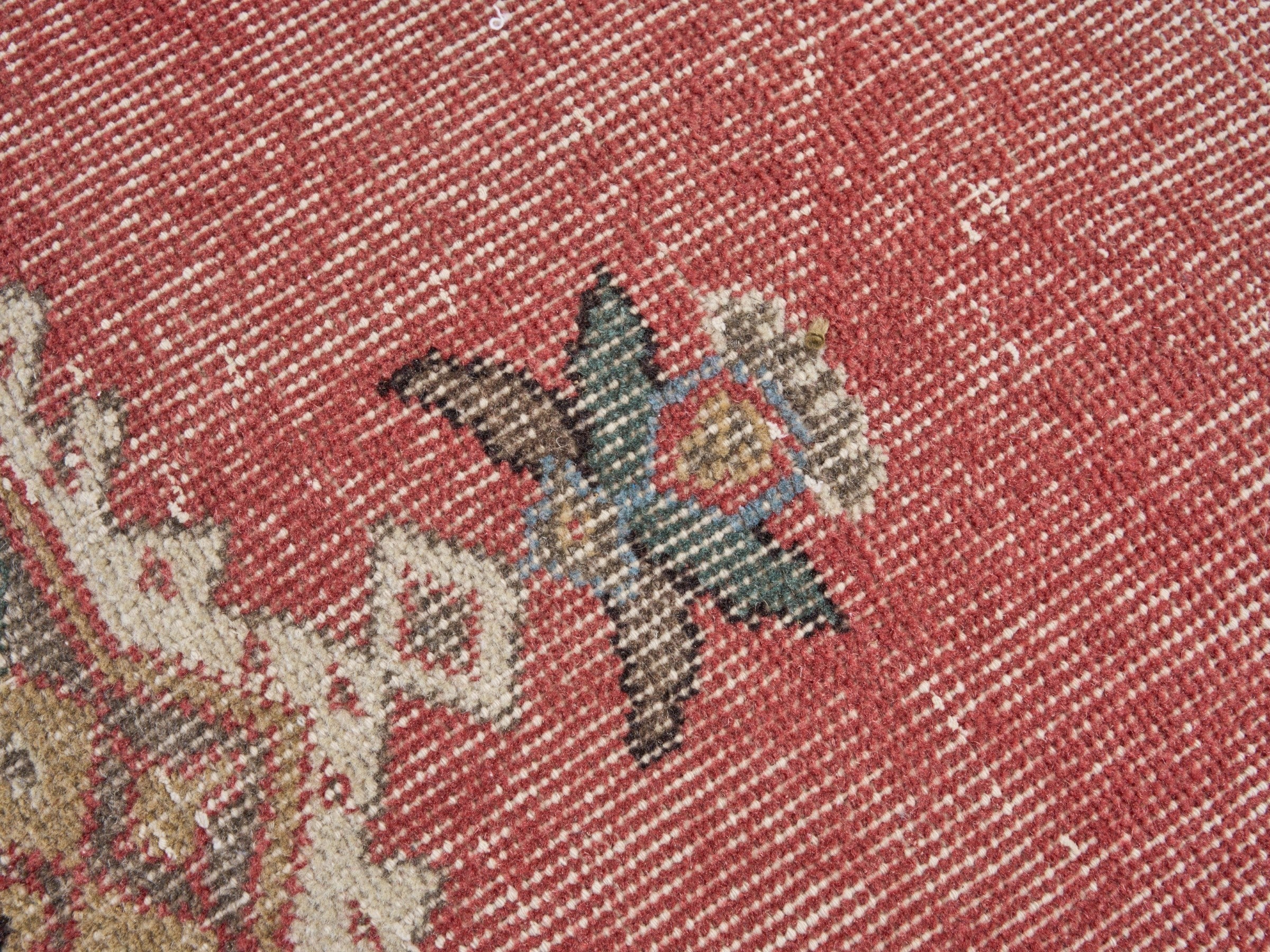 Turkish Isparta area rug in faded red and tan, view 7 of 10