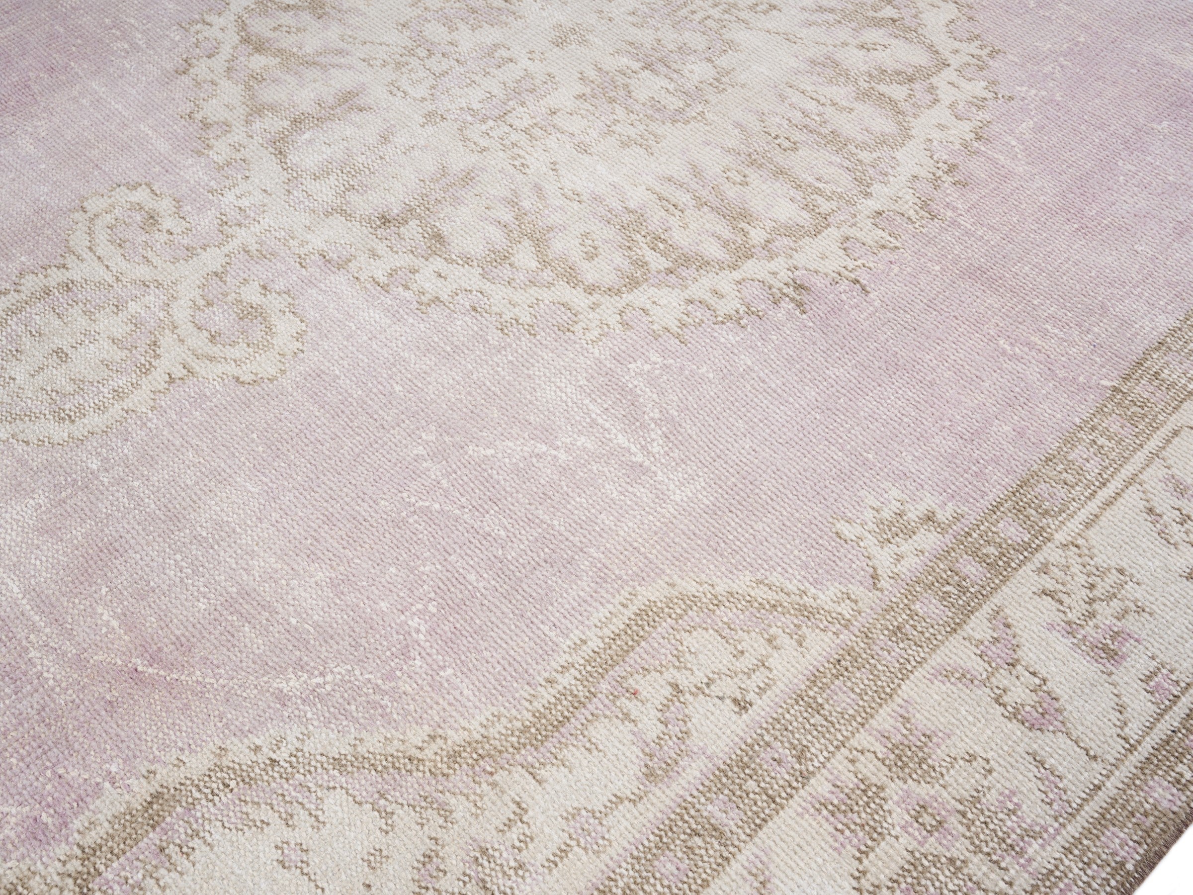 Turkish Manisa area rug in muted pink and cream, view 5 of 10