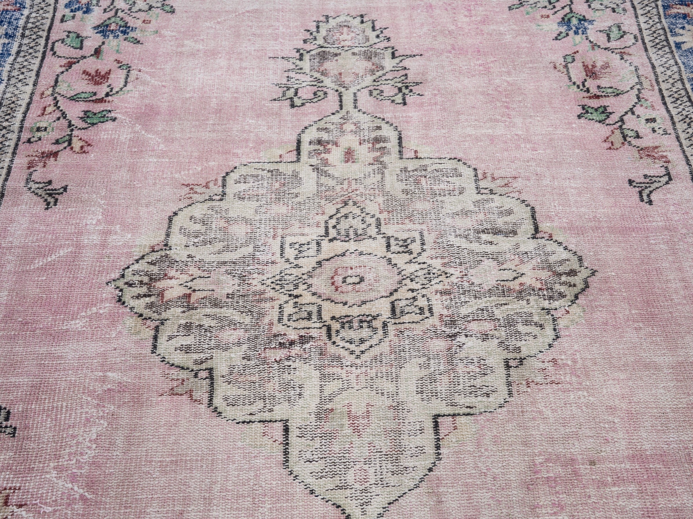 Turkish Manisa area rug in dusty rose and dark blue, view 4 of 10