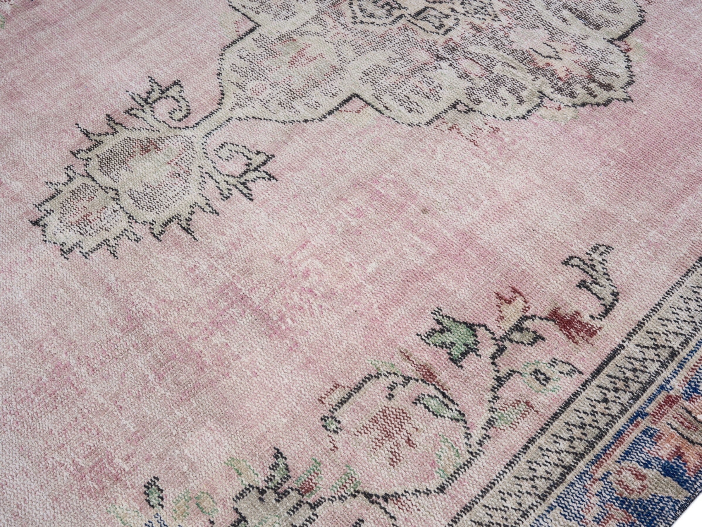 Turkish Manisa area rug in dusty rose and dark blue, view 5 of 10