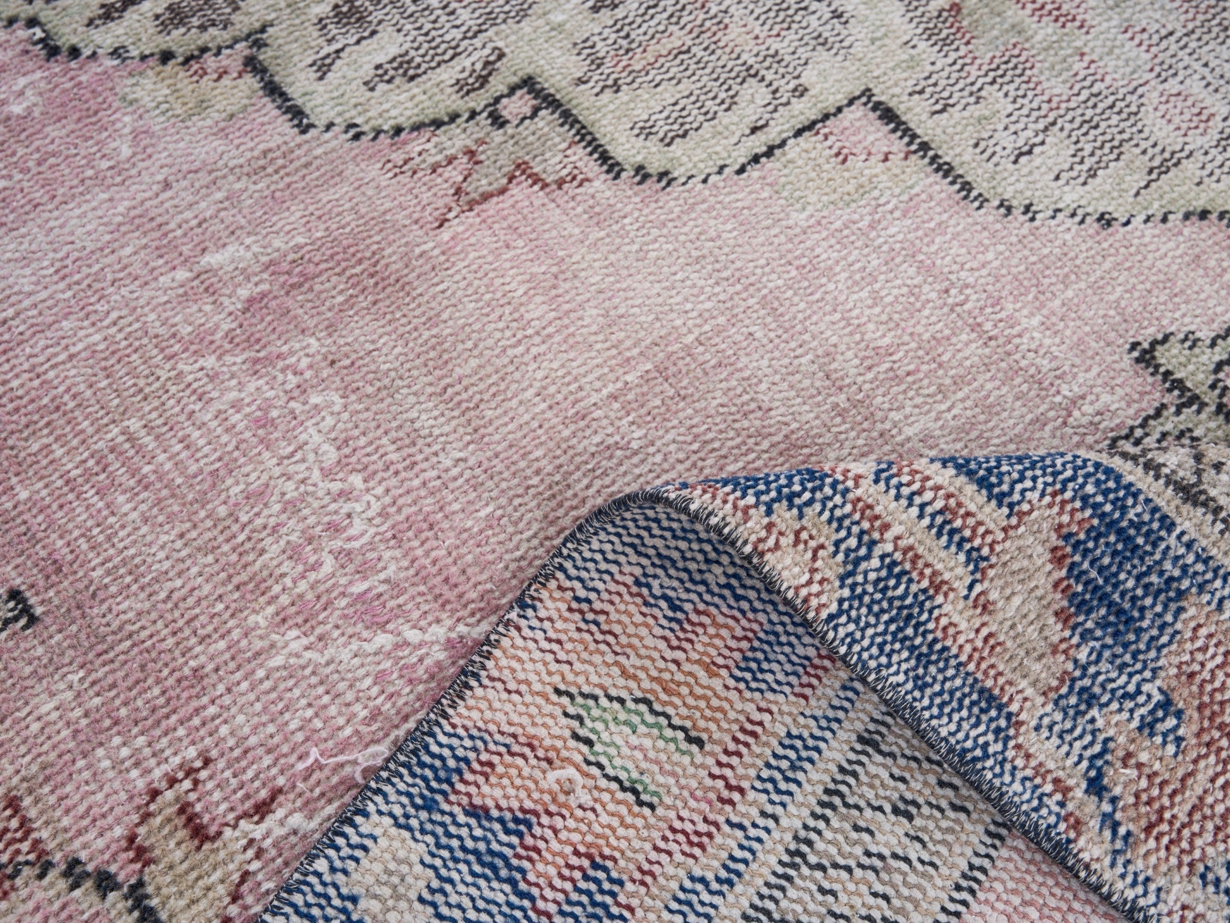 Turkish Manisa area rug in dusty rose and dark blue, view 9 of 10