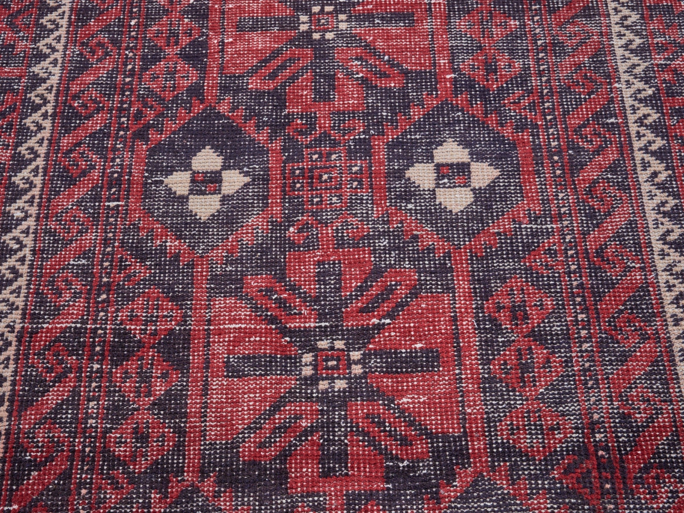 Persian Baluch area rug in burgundy and faded red, view 4 of 10