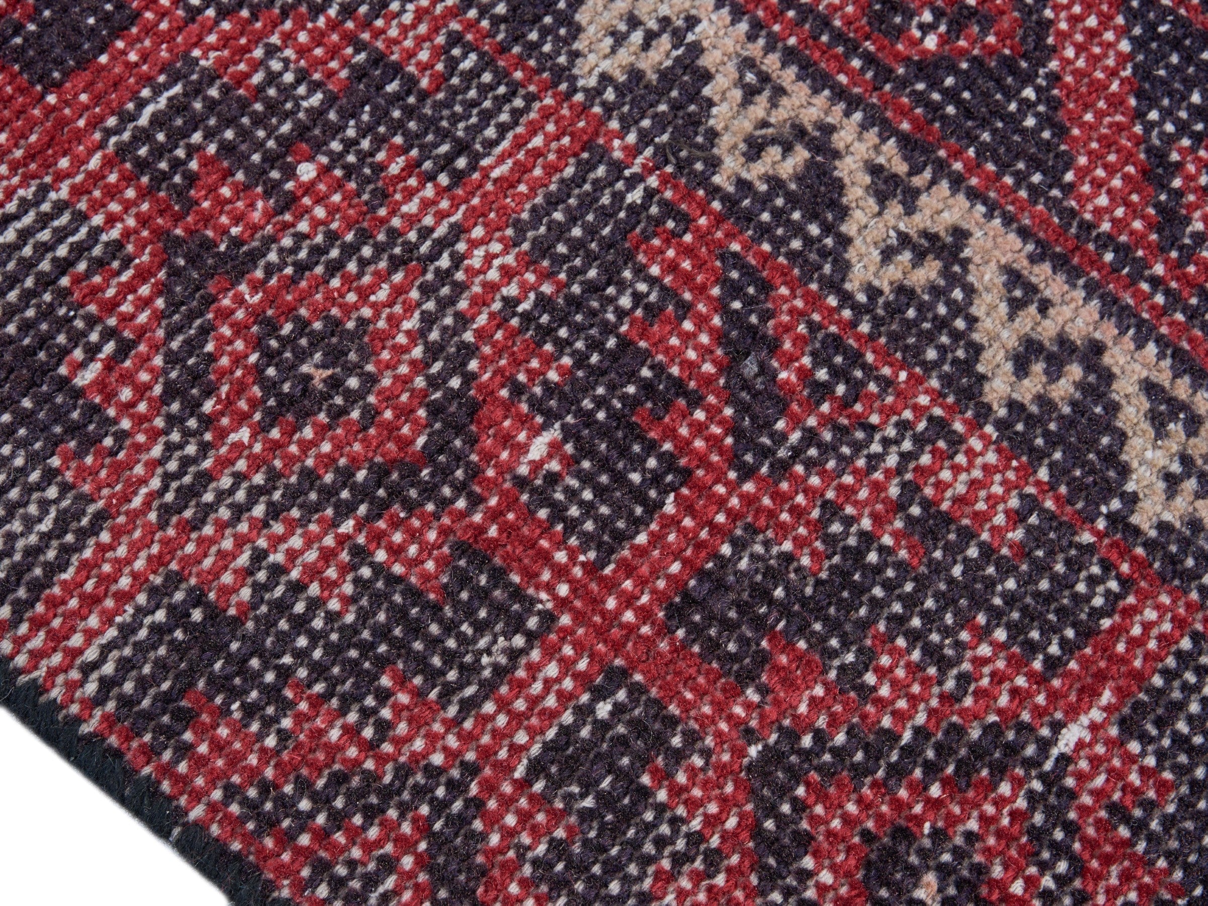 Persian Baluch area rug in burgundy and faded red, view 6 of 10