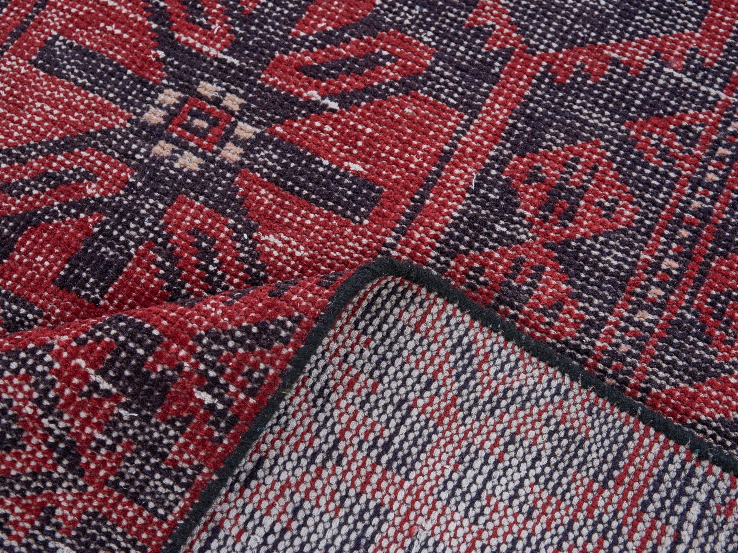 Persian Baluch area rug in burgundy and faded red, view 9 of 10