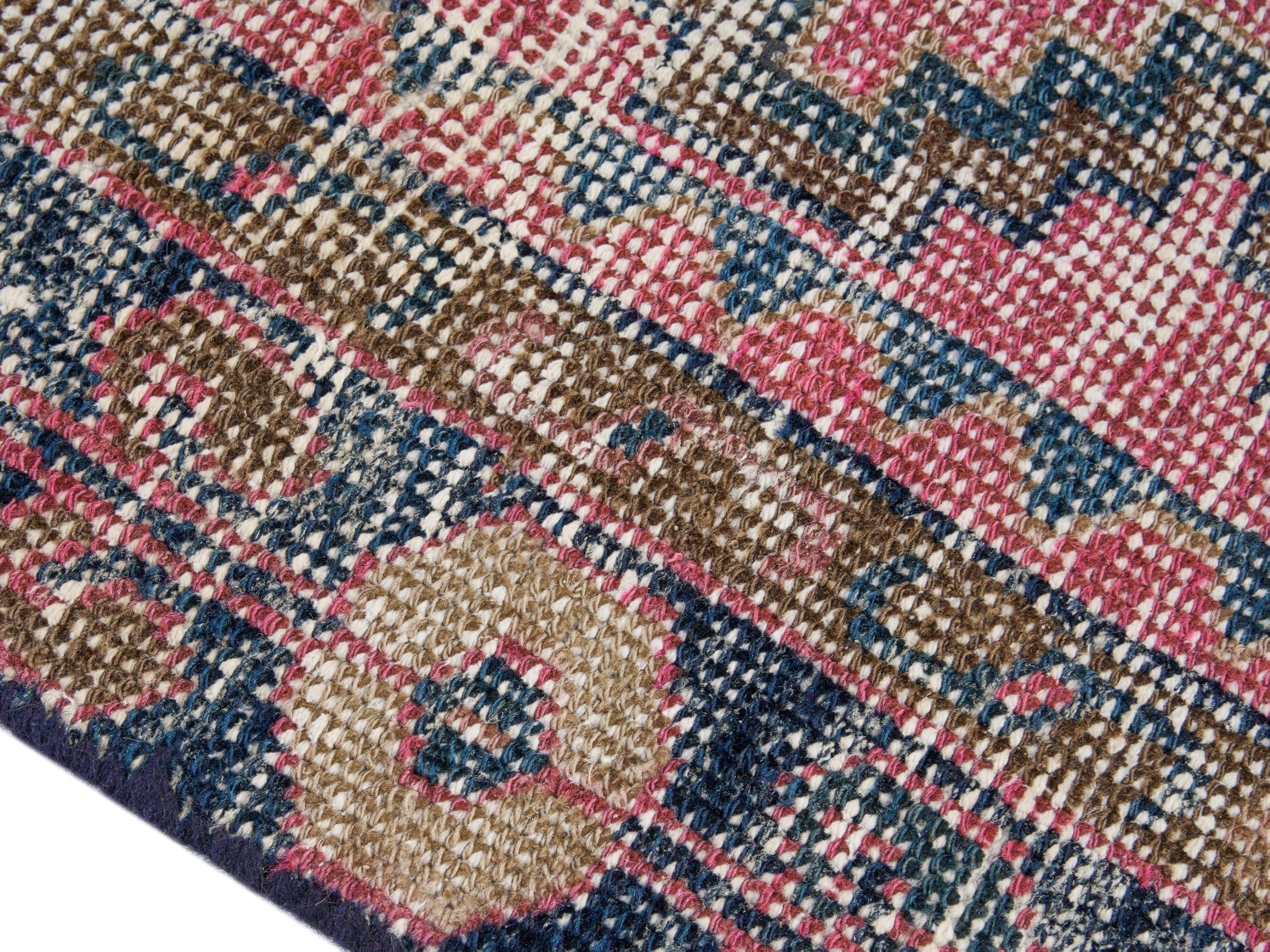 Persian Lori area rug in dusty rose and dark teal, view 6 of 10