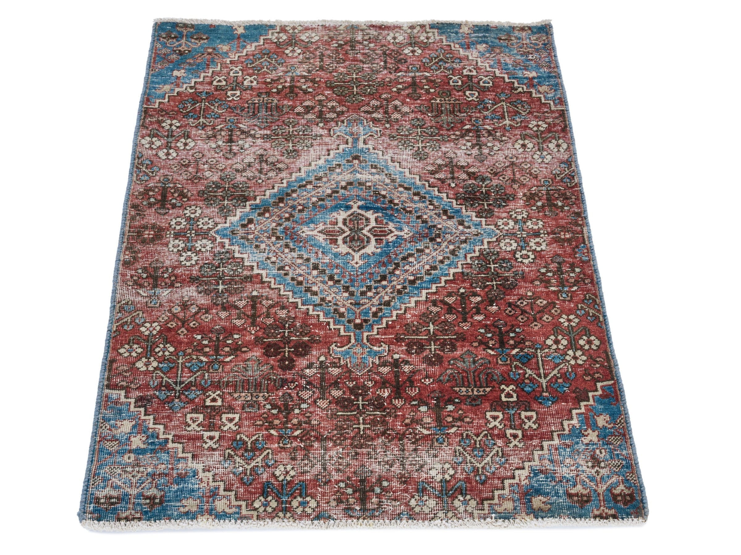 Persian Joshaghan accent rug in brick and denim, view 2 of 9