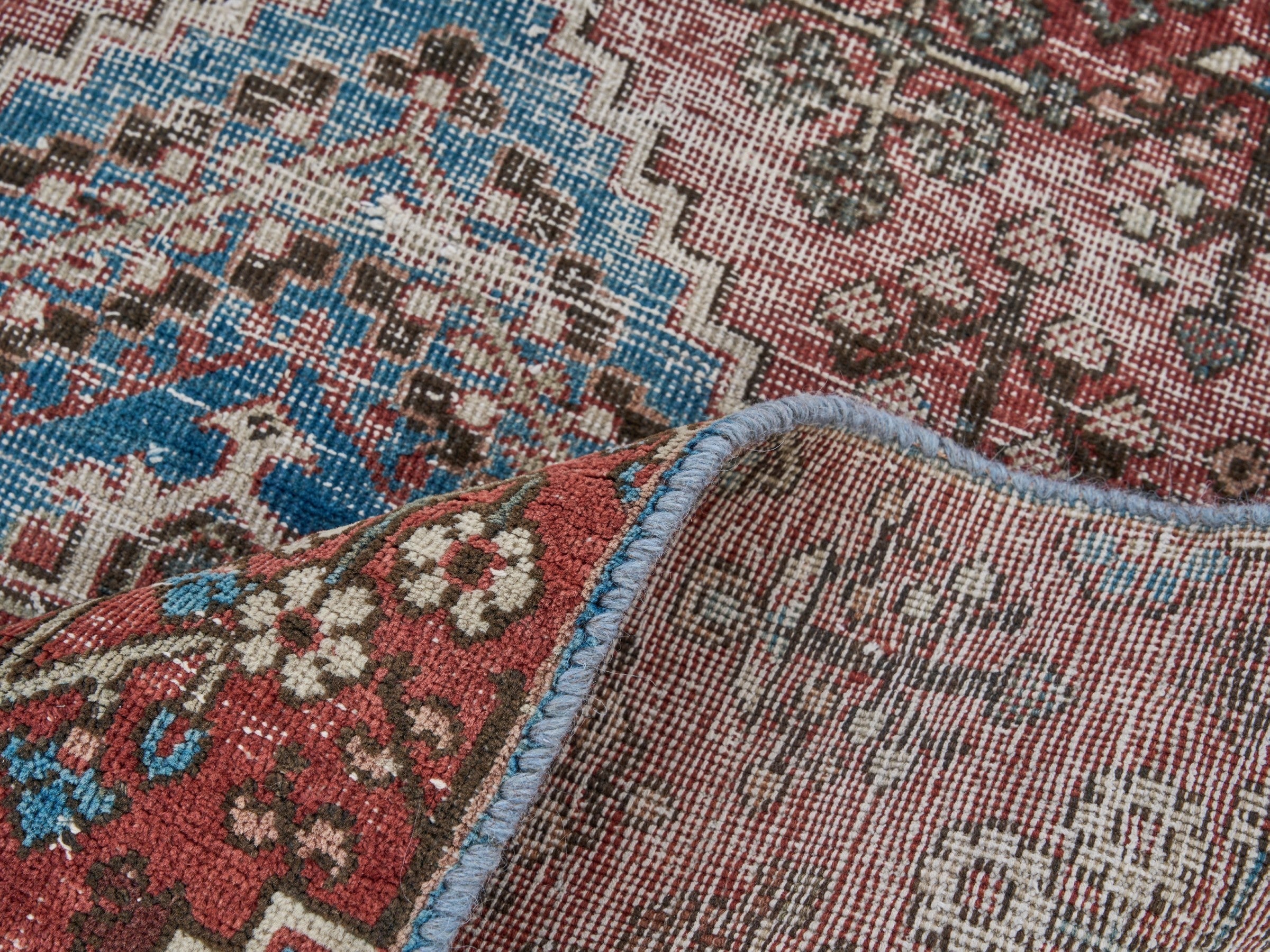Persian Joshaghan accent rug in brick and denim, view 8 of 9