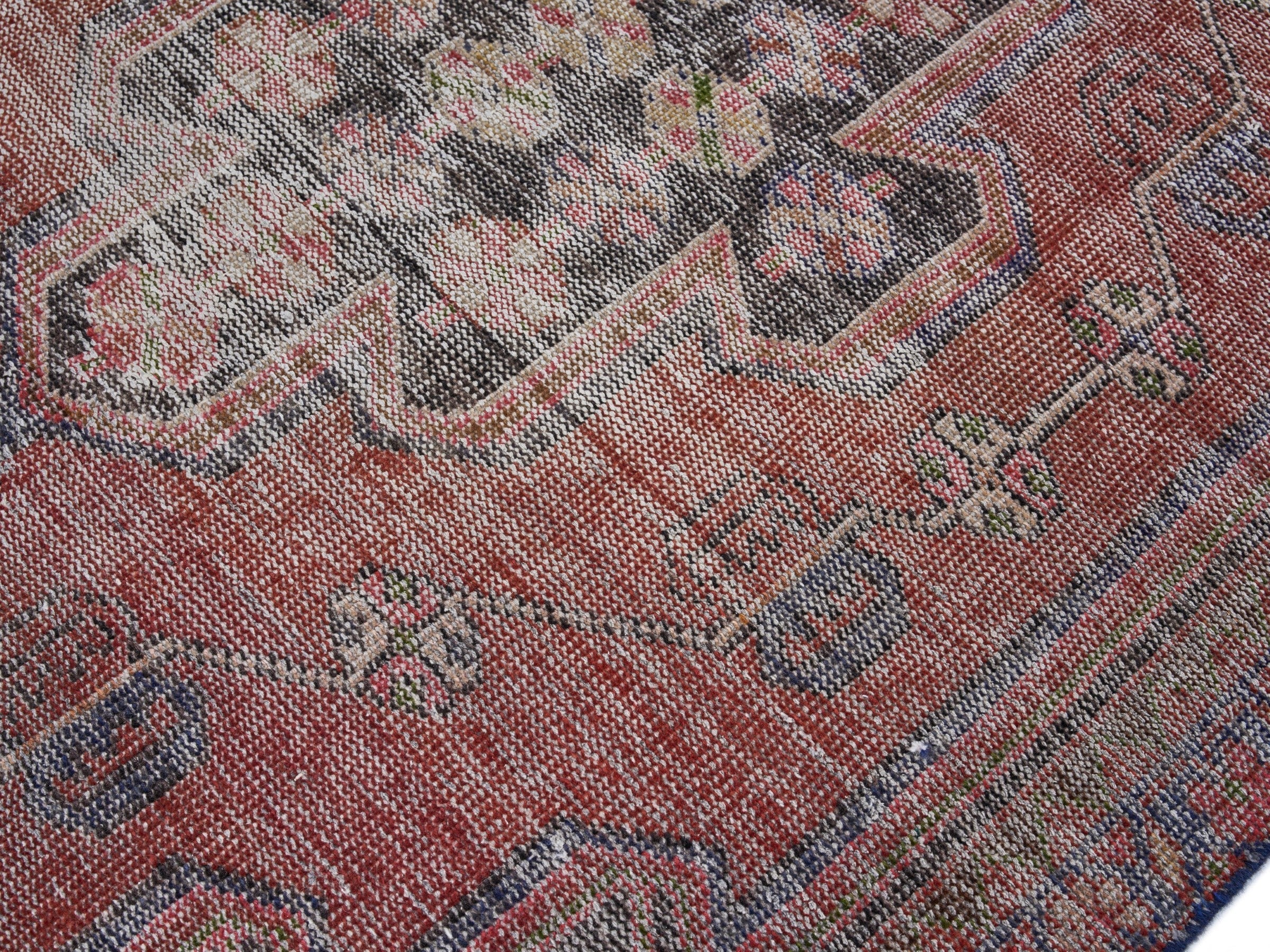 Persian Saveh area rug in burgundy and faded red, view 5 of 10