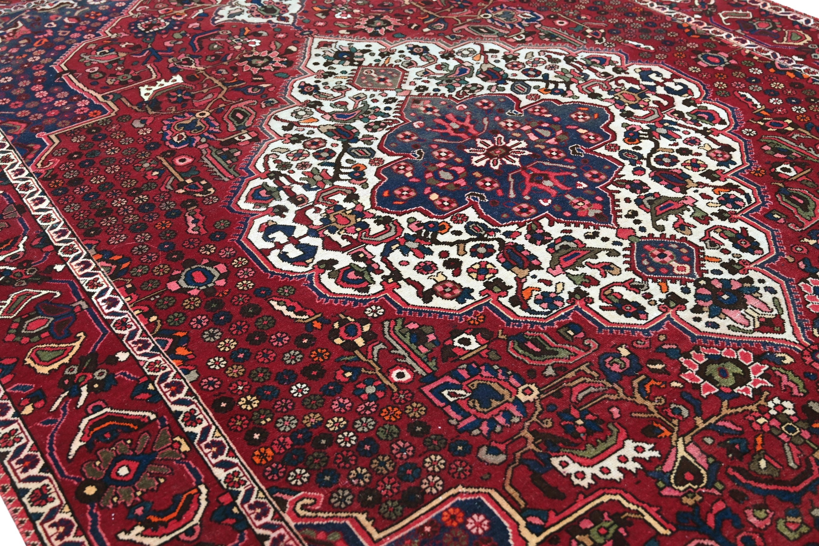Persian Bakhtiari oversized rug in burgundy and deep red, view 10 of 18