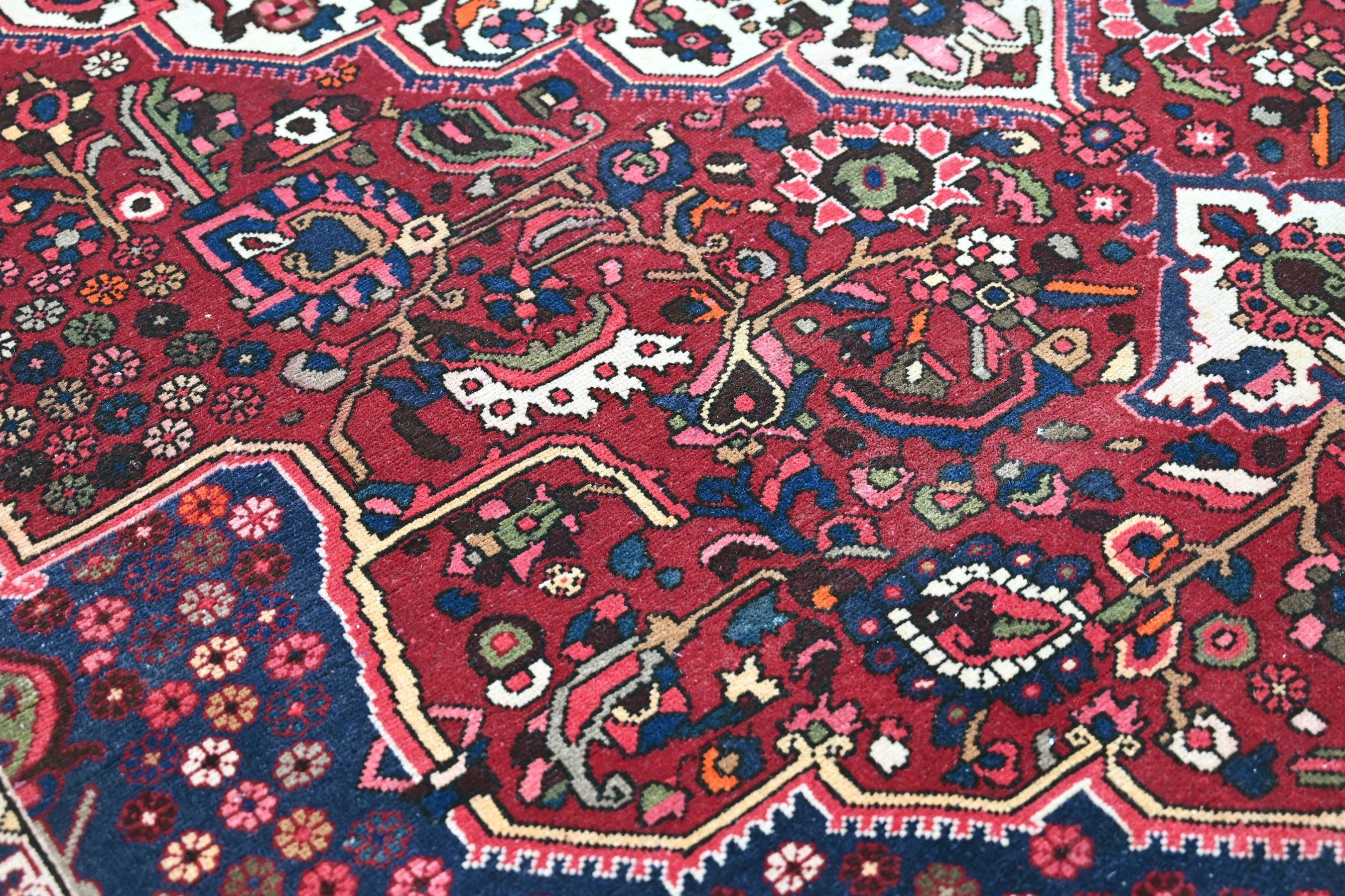 Persian Bakhtiari oversized rug in burgundy and deep red, view 11 of 18