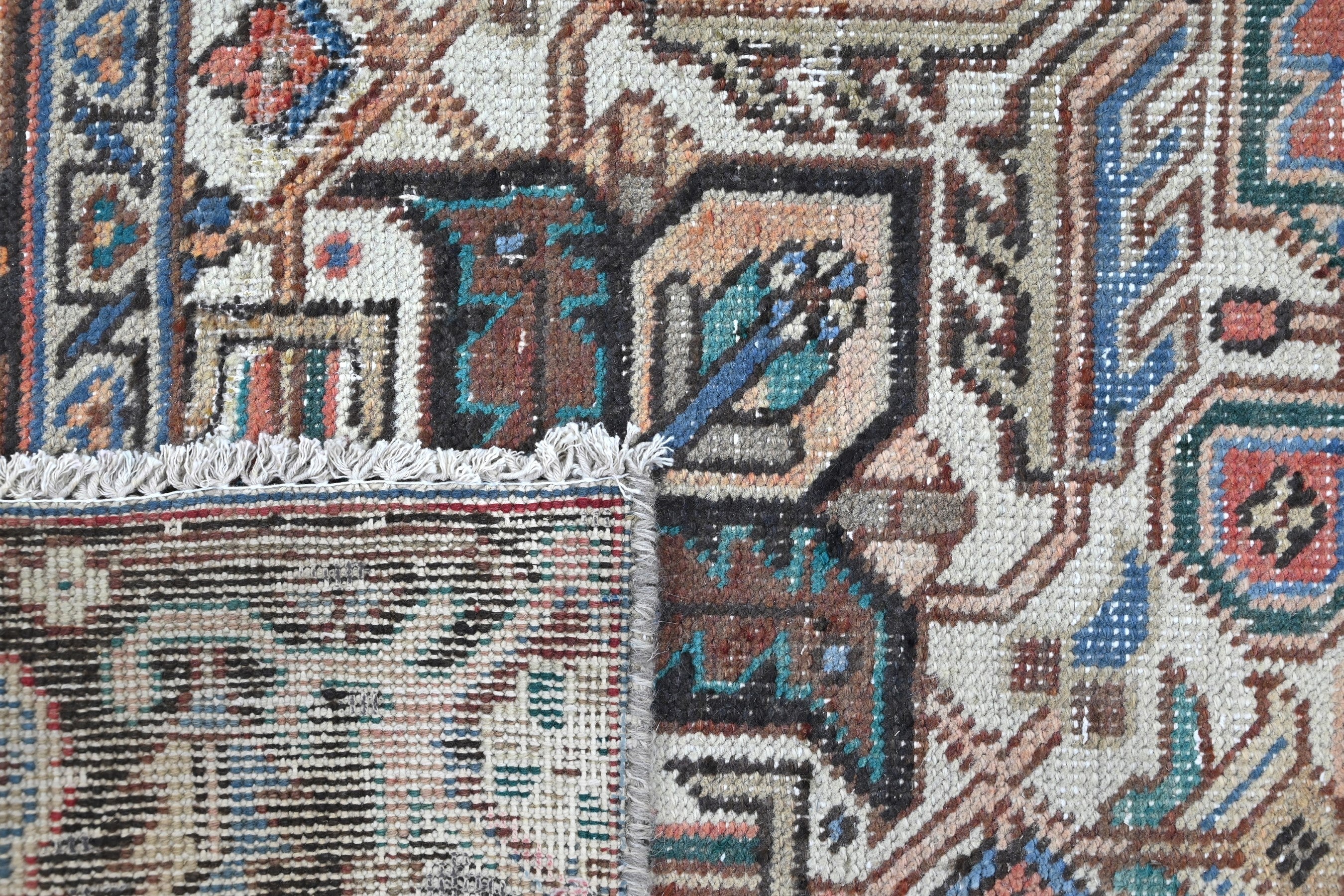 Persian Heriz area rug in terracotta and navy, view 21 of 21