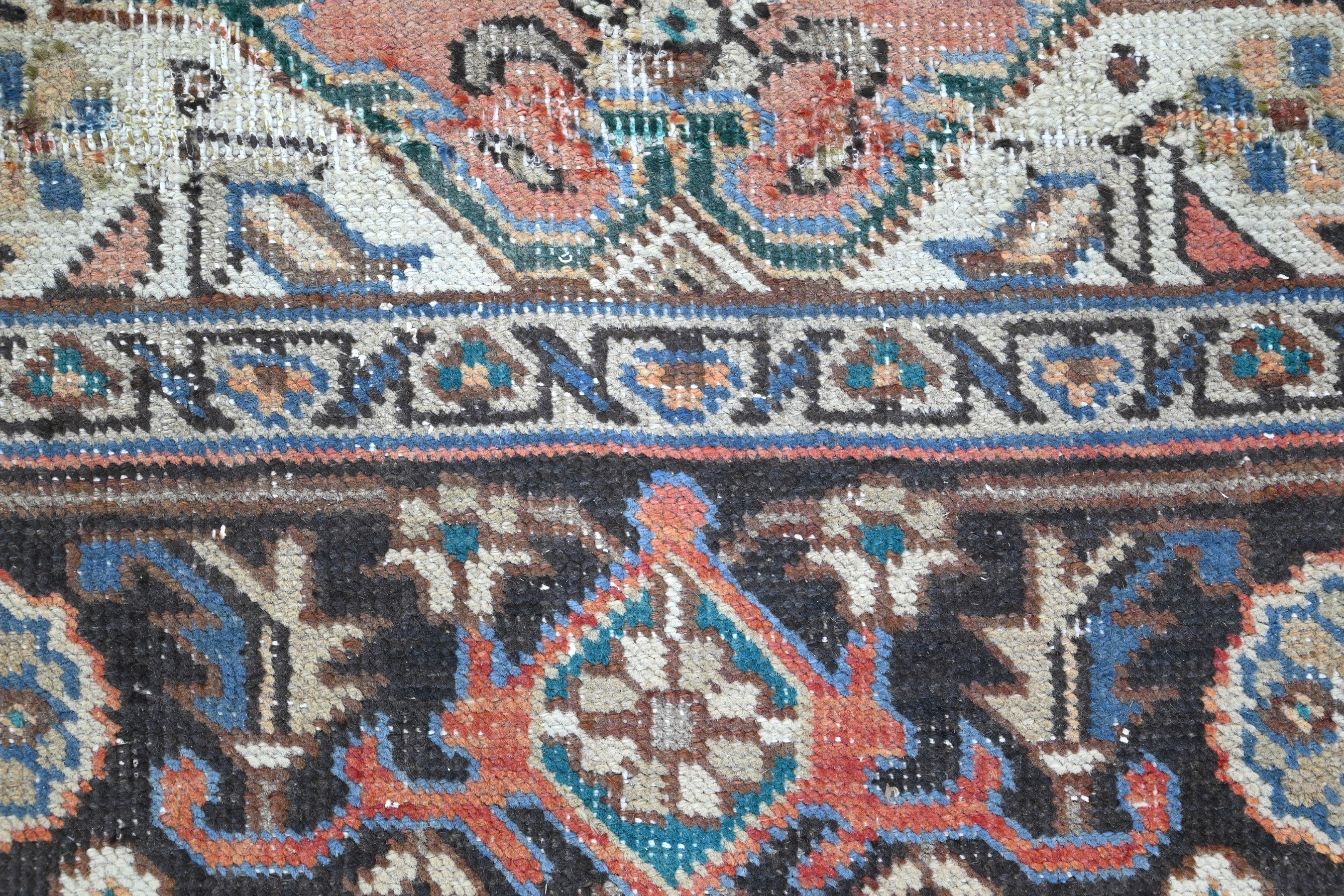 Persian Heriz area rug in terracotta and navy, view 10 of 21