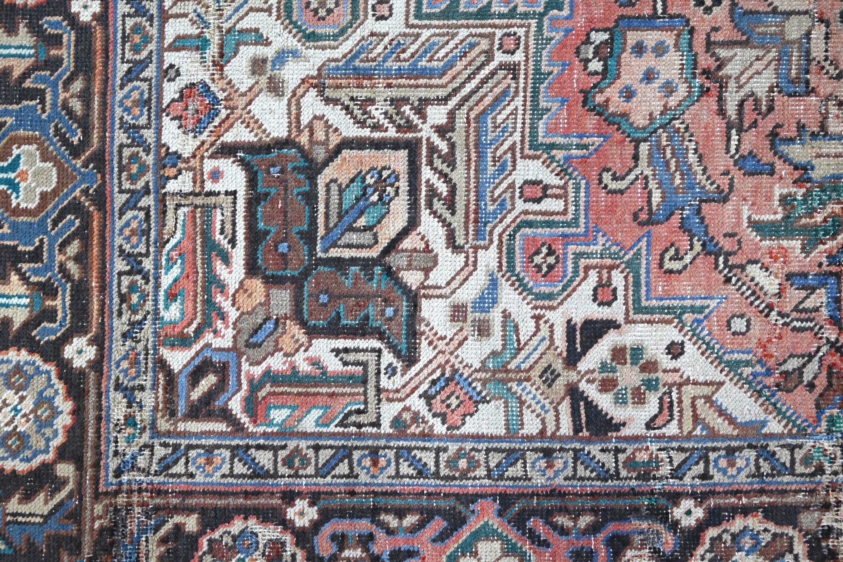 Persian Heriz area rug in terracotta and navy, view 8 of 21