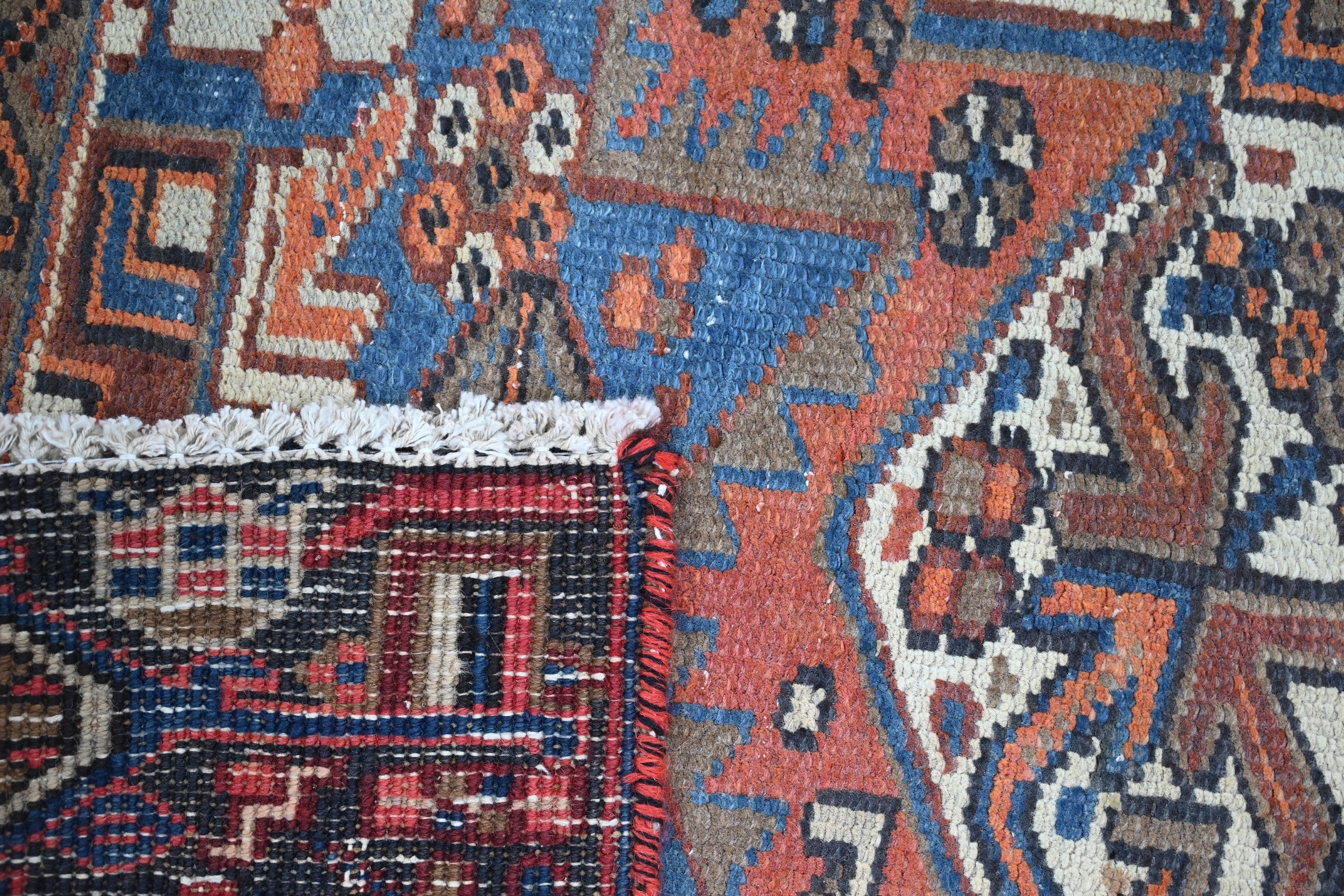 Persian Heriz area rug in rust and navy, view 21 of 21