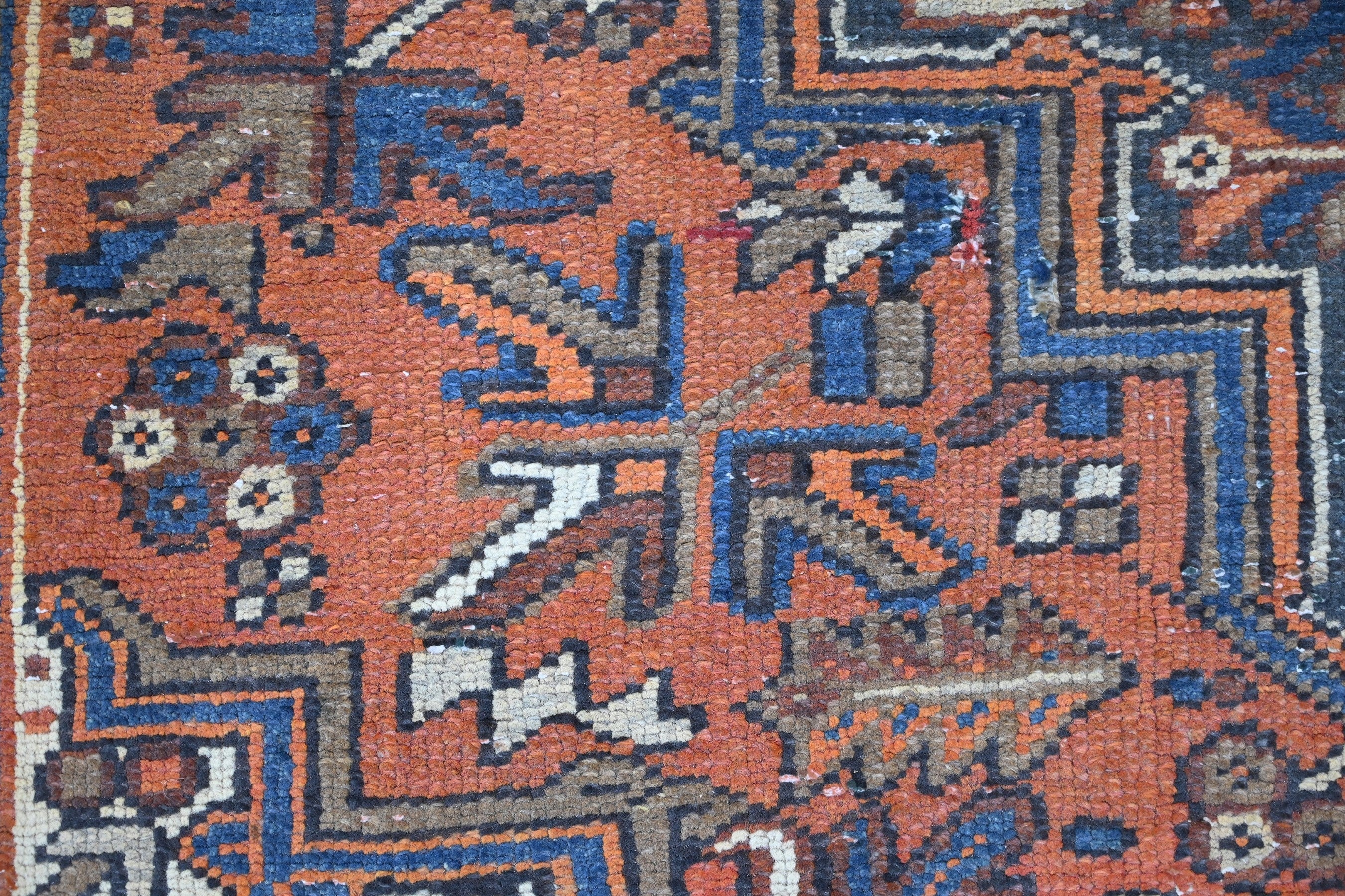 Persian Heriz area rug in rust and navy, view 11 of 21
