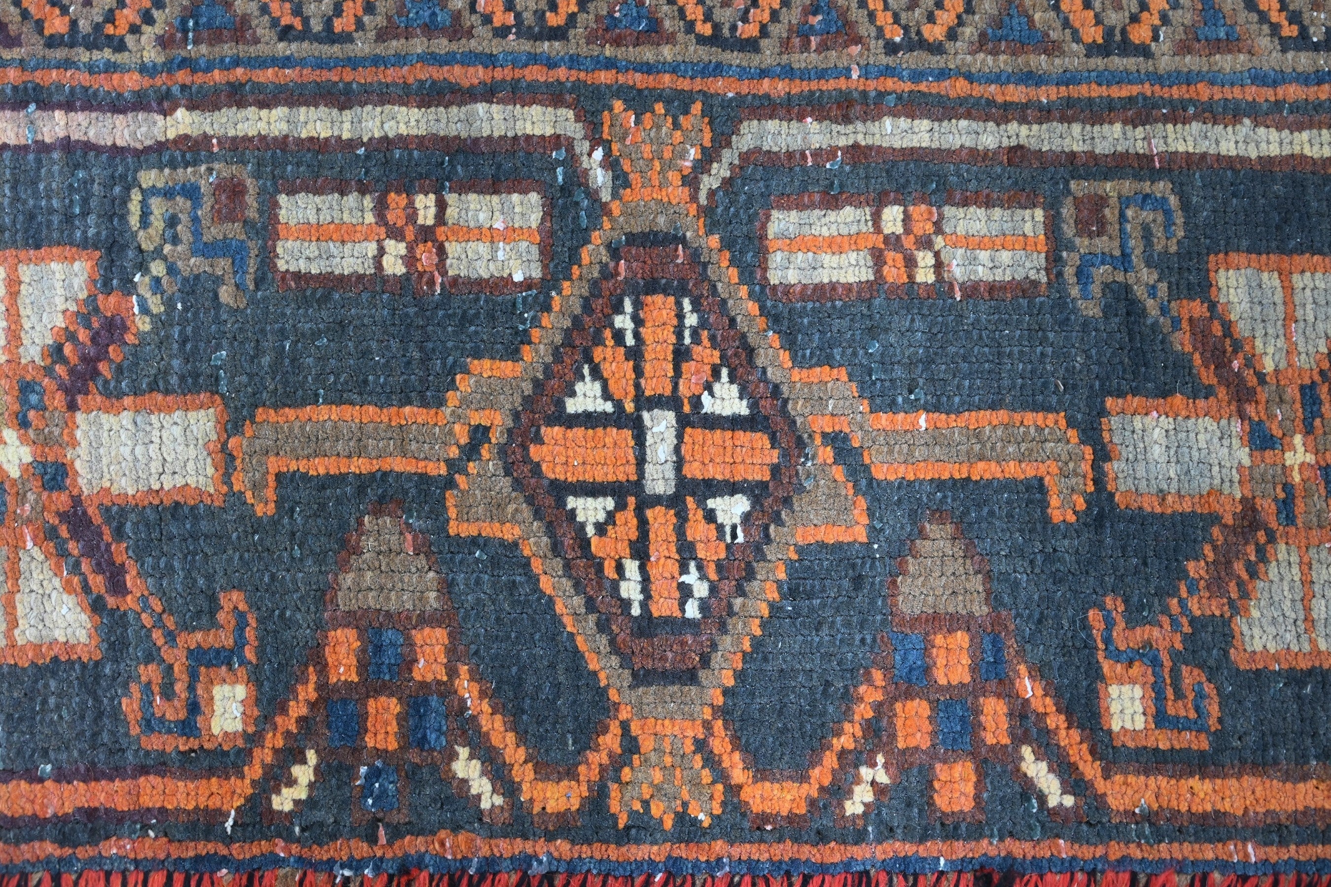 Persian Heriz area rug in rust and navy, view 12 of 21