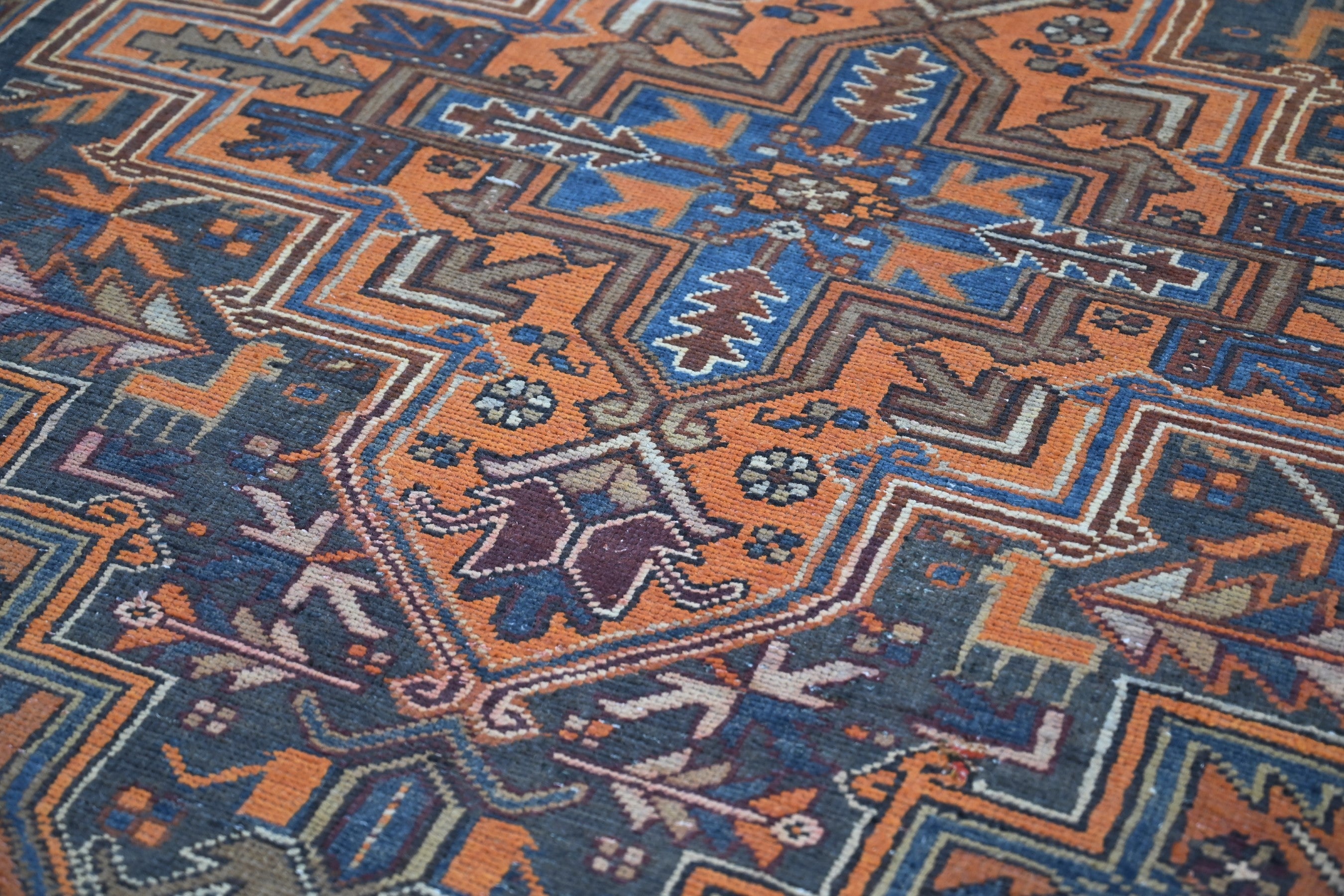 Persian Heriz area rug in rust and navy, view 14 of 21