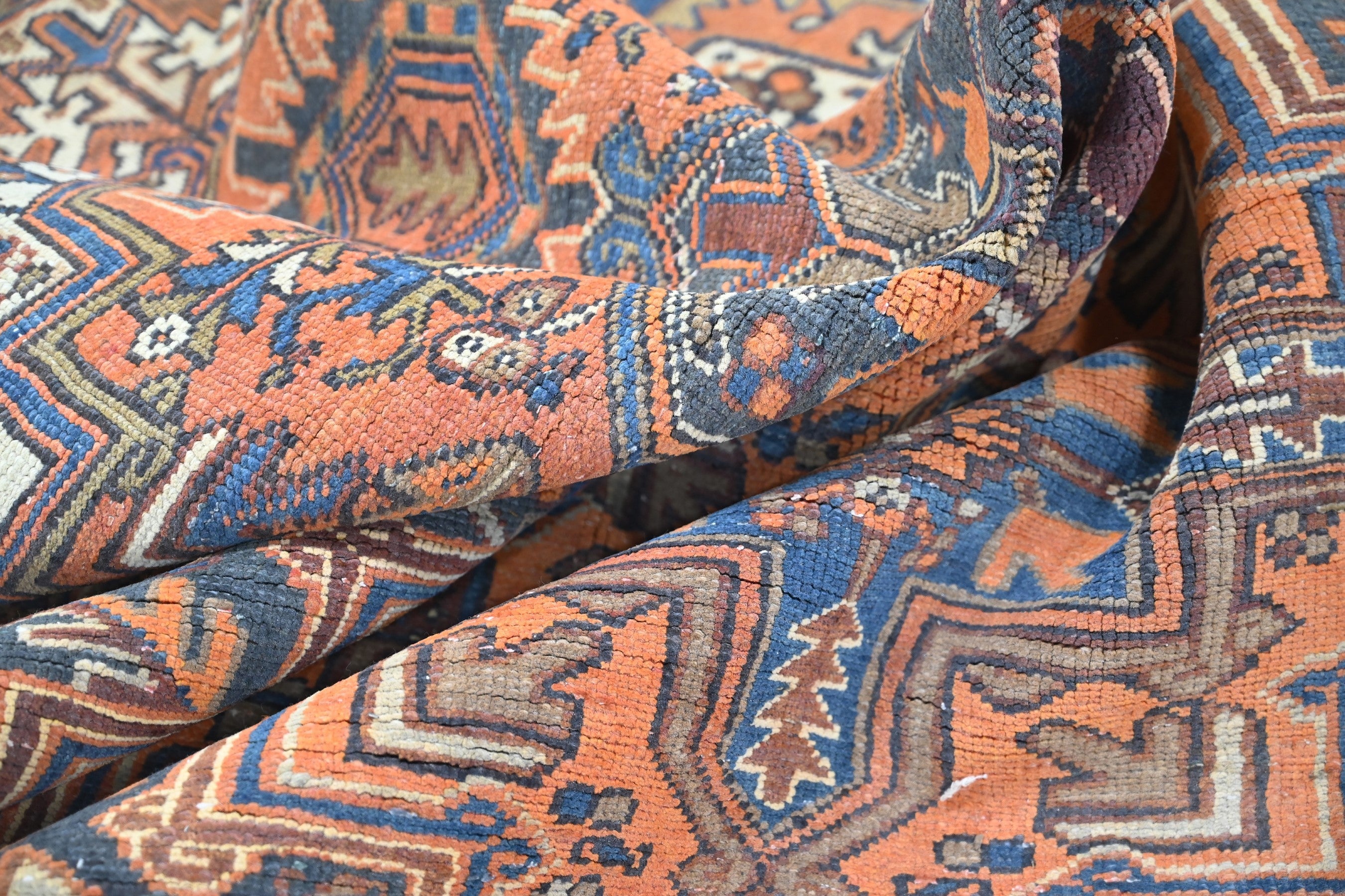 Persian Heriz area rug in rust and navy, view 18 of 21