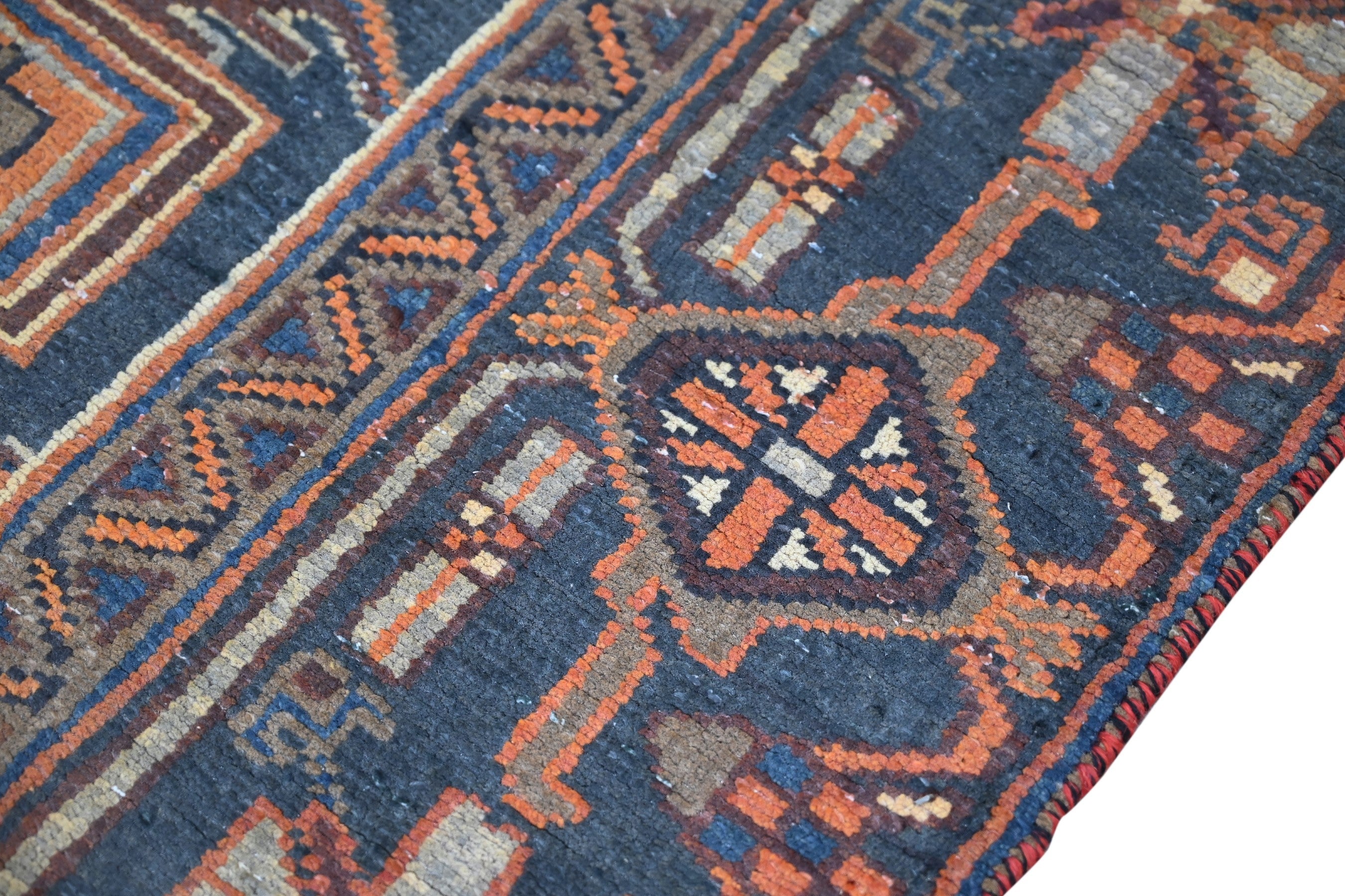 Persian Heriz area rug in rust and navy, view 7 of 21