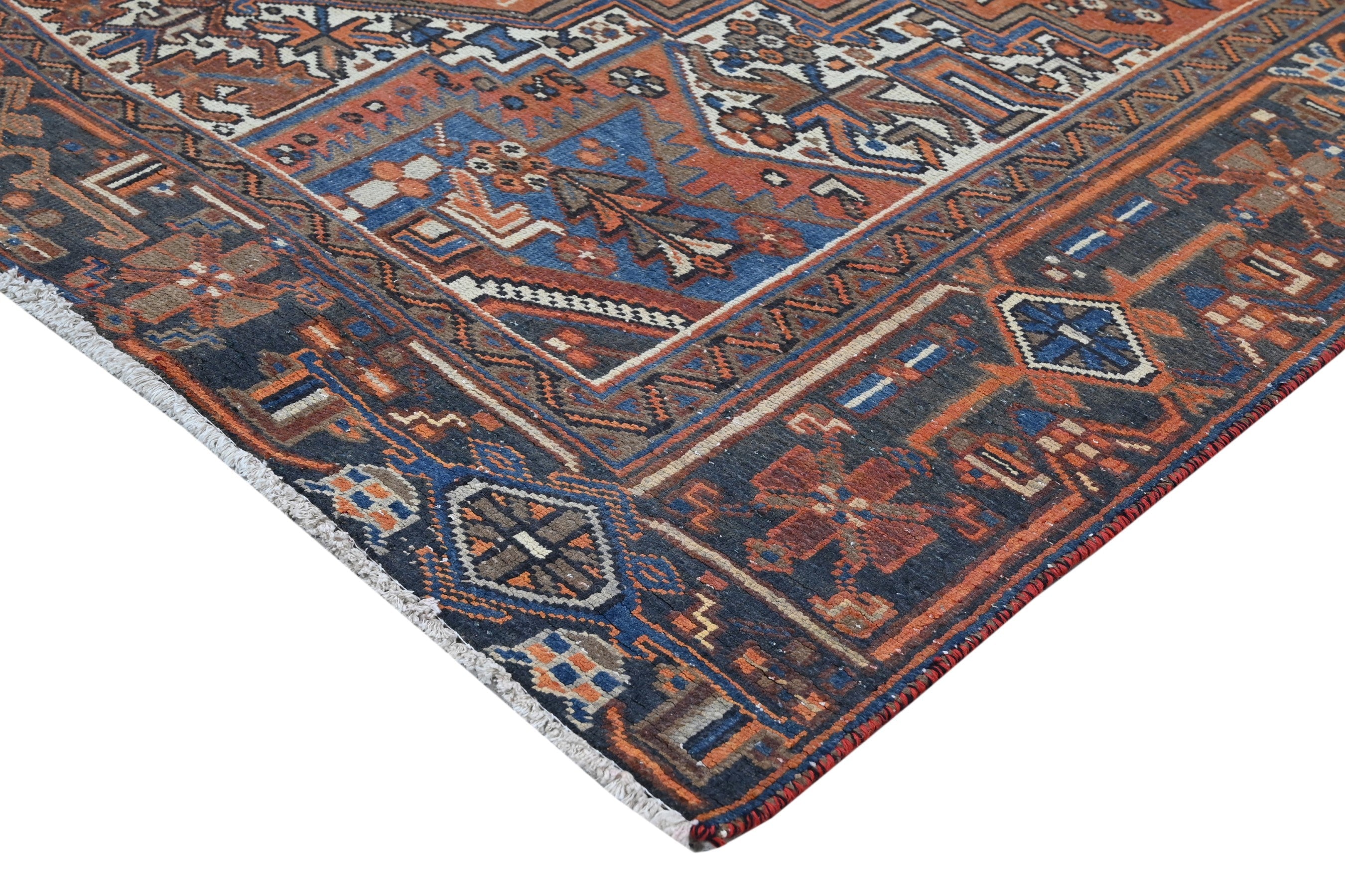 Persian Heriz area rug in rust and navy, view 9 of 21