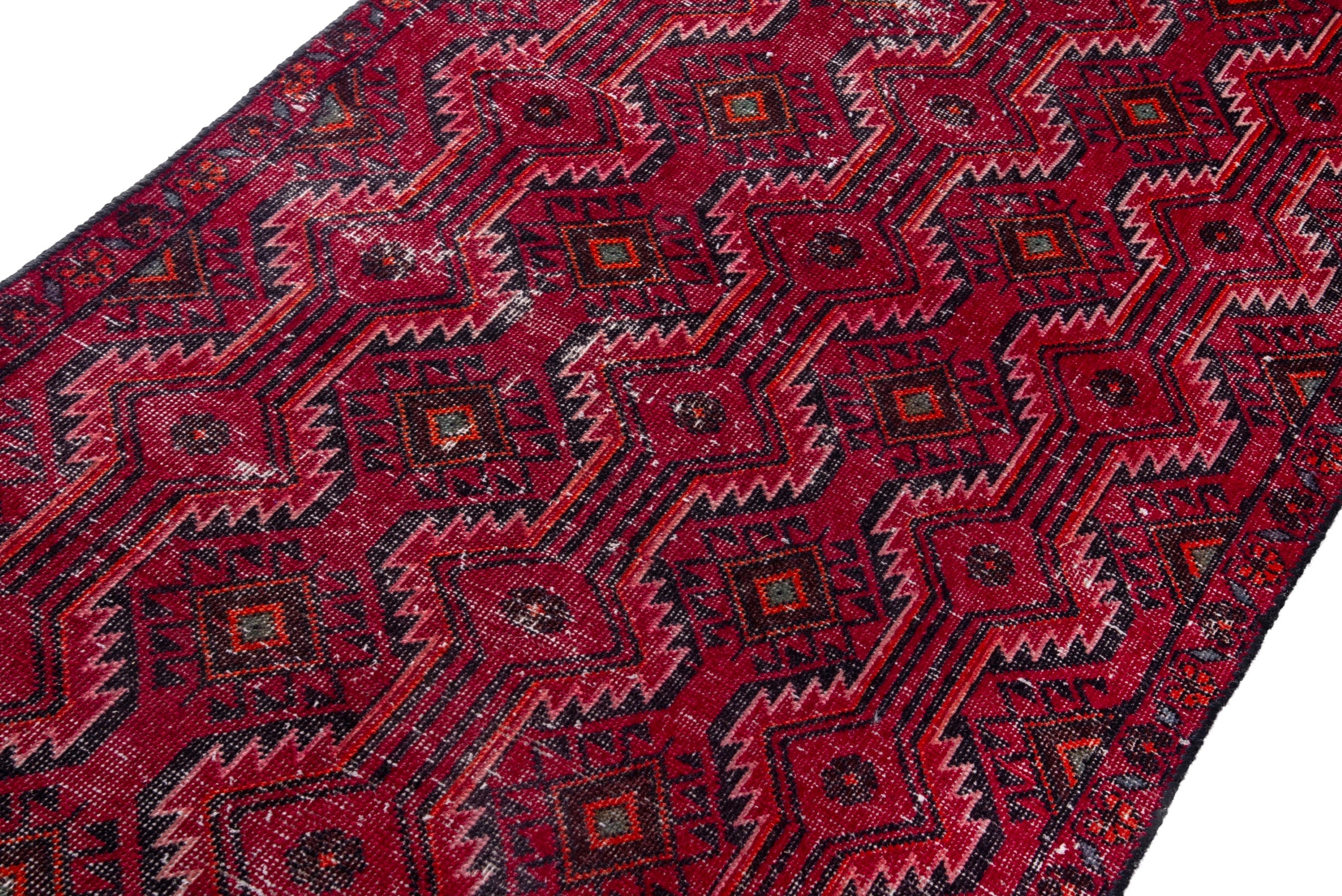 Persian Baluch runner rug in deep red and burgundy, view 4 of 14