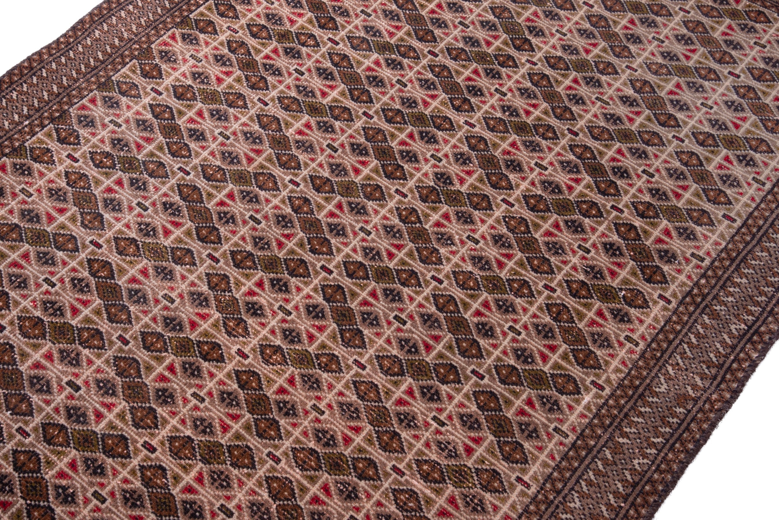 Persian Torkaman accent rug in terracotta and dark brown, view 4 of 16