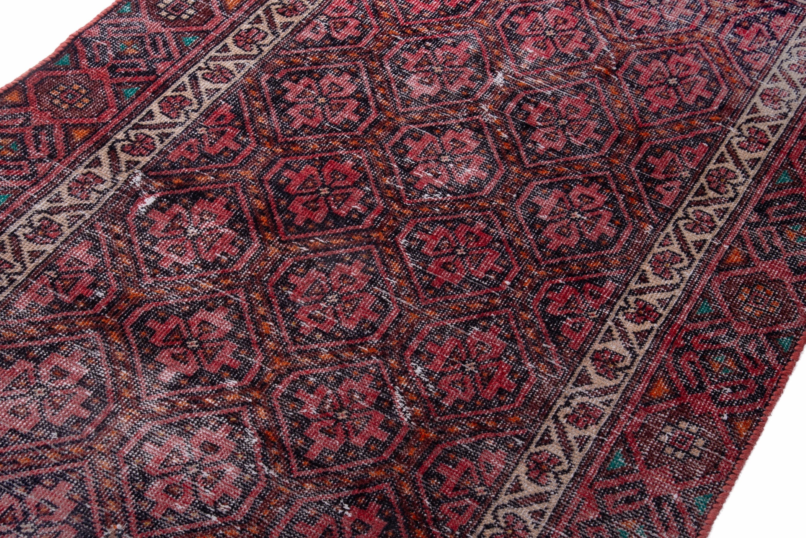 Persian Baluch accent rug in deep red and cream, view 4 of 16