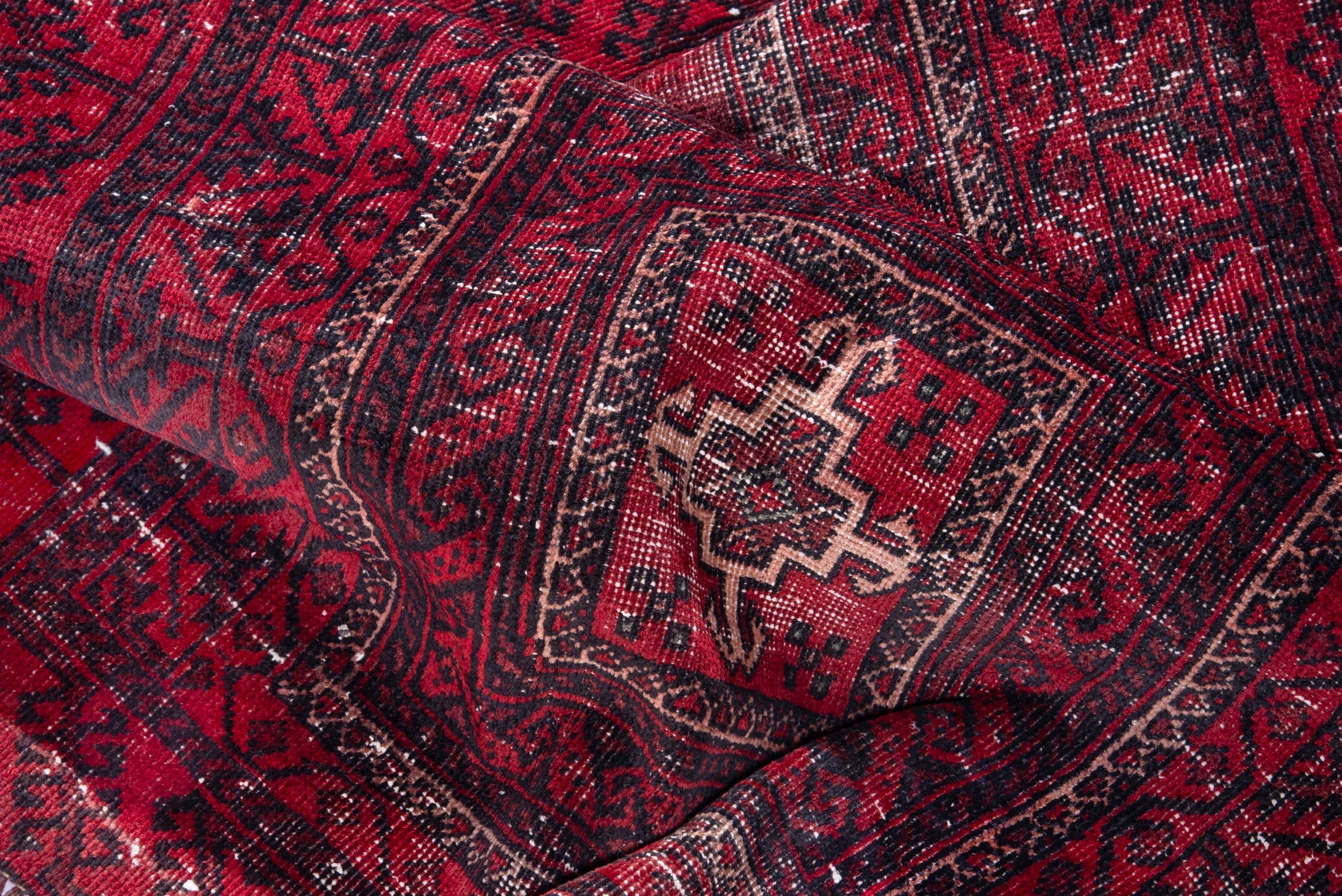 Persian Baluch runner rug in deep red and faded red, view 16 of 17