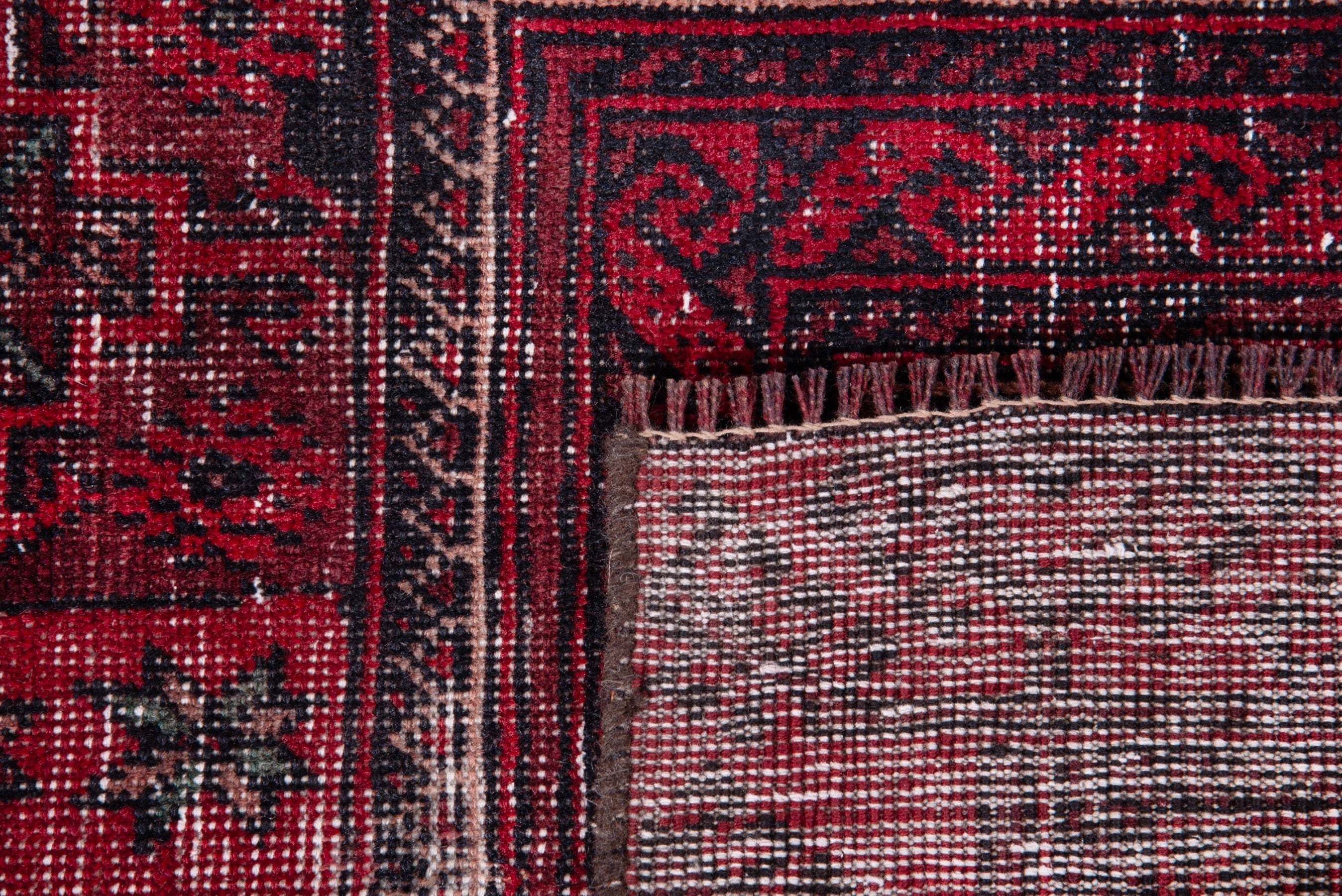 Persian Baluch runner rug in deep red and faded red, view 17 of 17