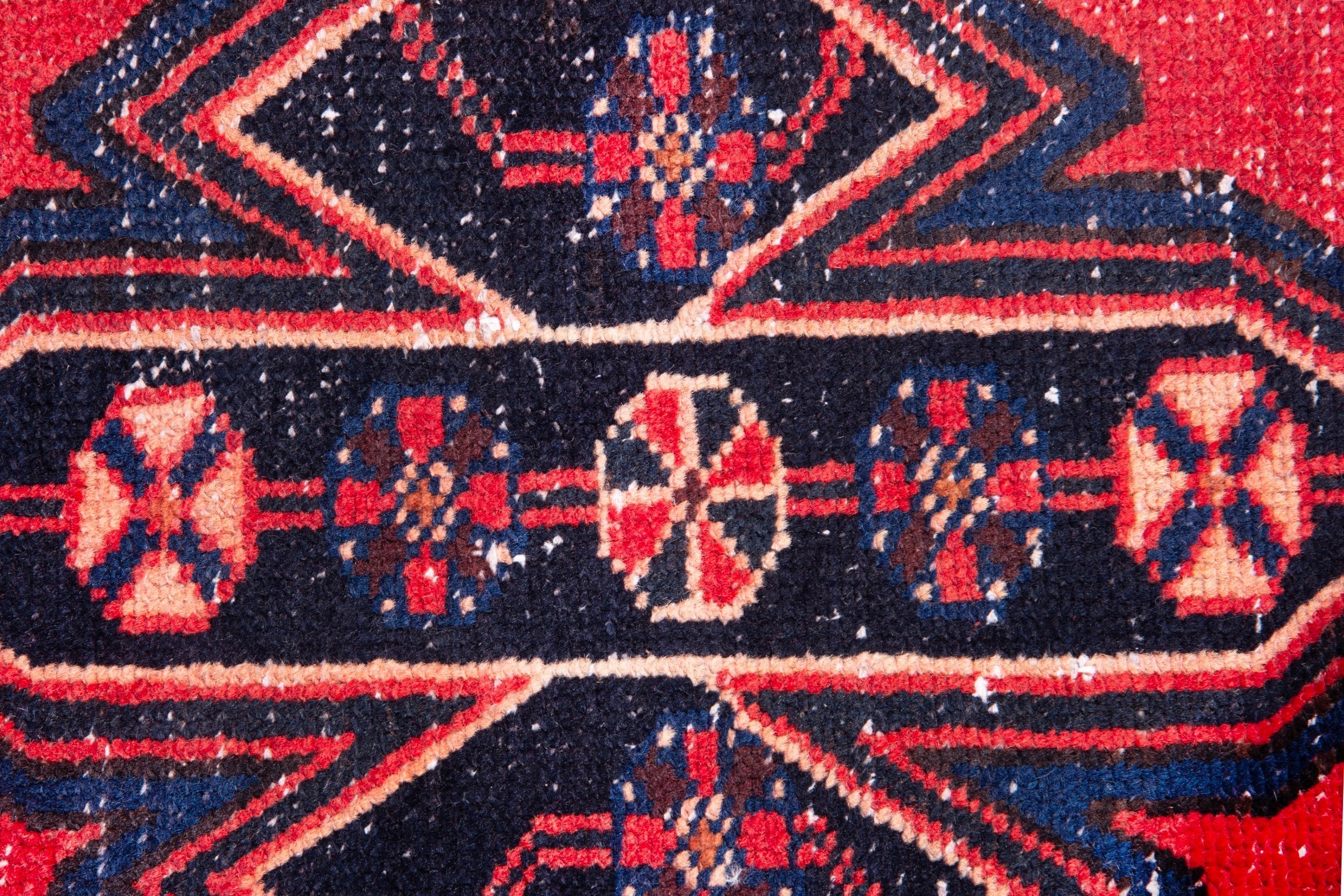 Persian Saveh accent rug in deep red and navy, view 12 of 17