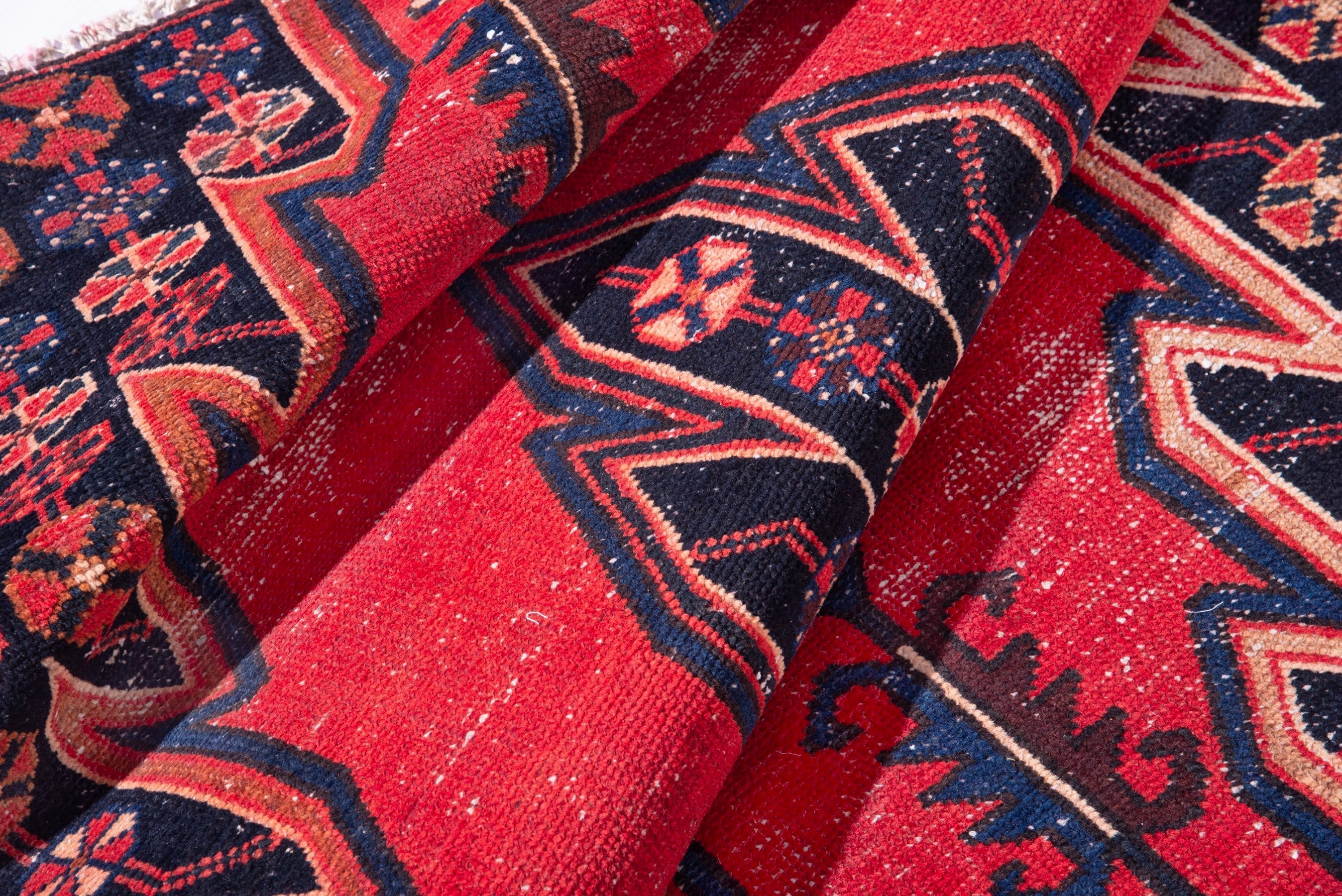 Persian Saveh accent rug in deep red and navy, view 16 of 17