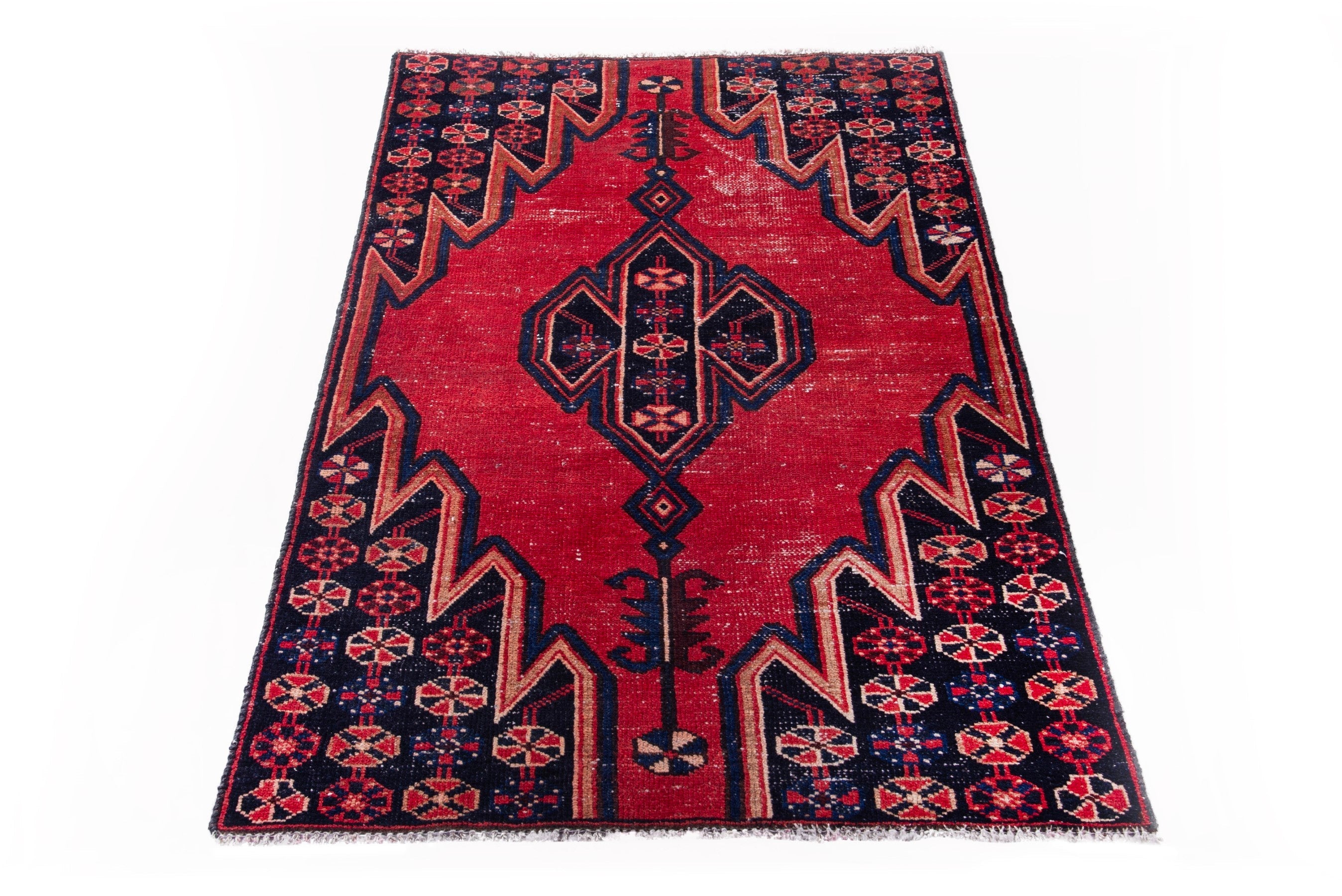 Persian Saveh accent rug in deep red and navy, view 2 of 17