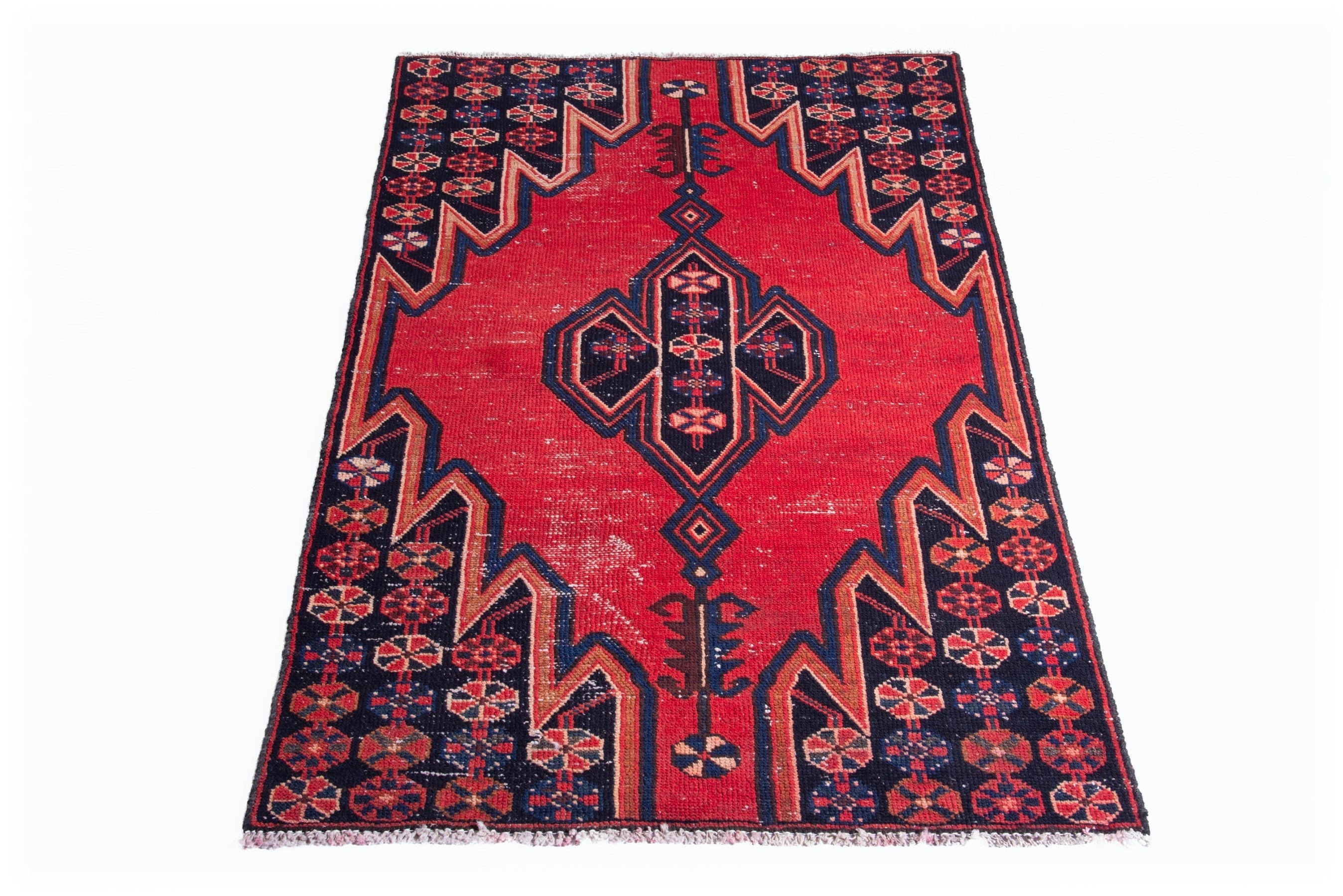 Persian Saveh accent rug in deep red and navy, view 3 of 17