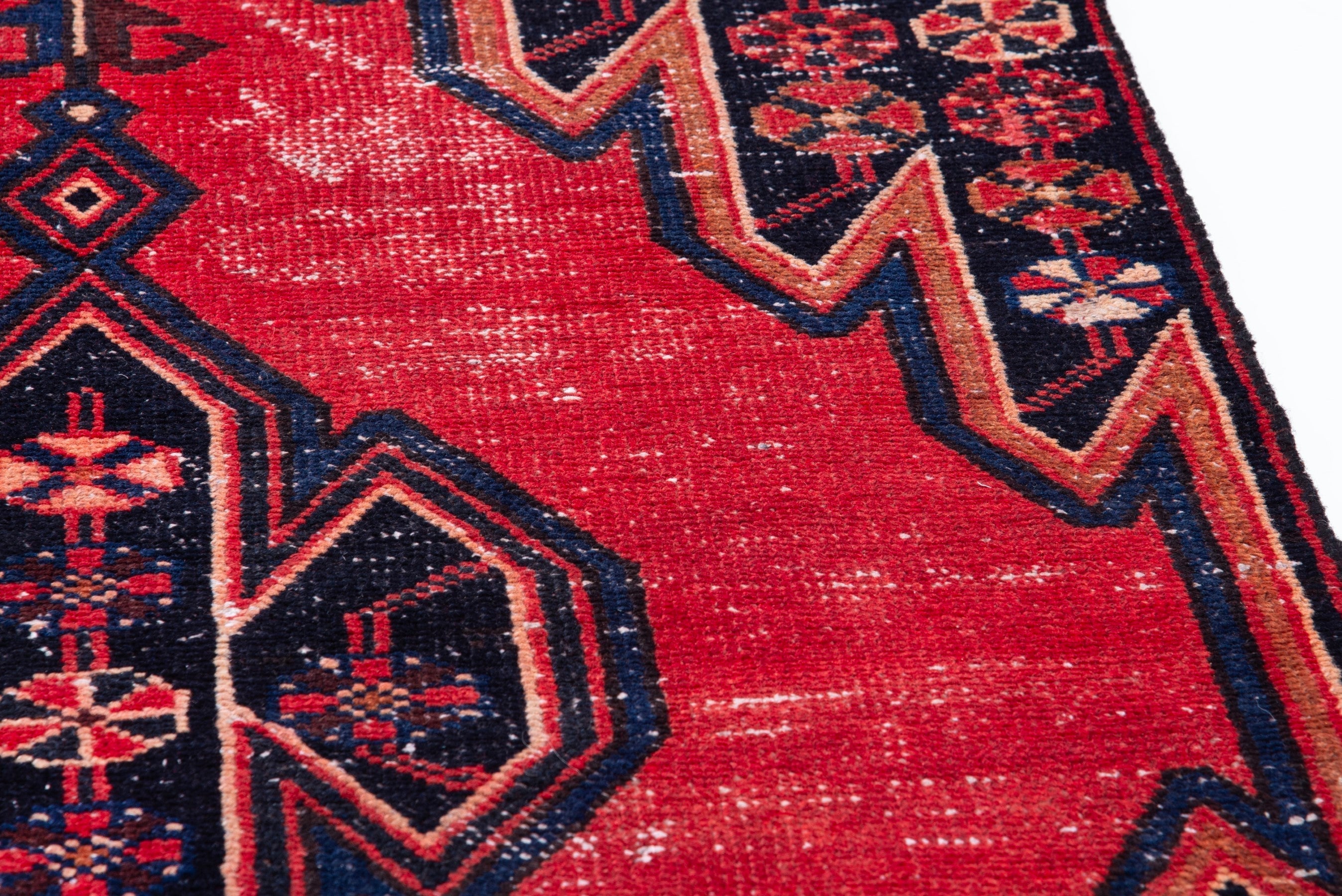 Persian Saveh accent rug in deep red and navy, view 7 of 17