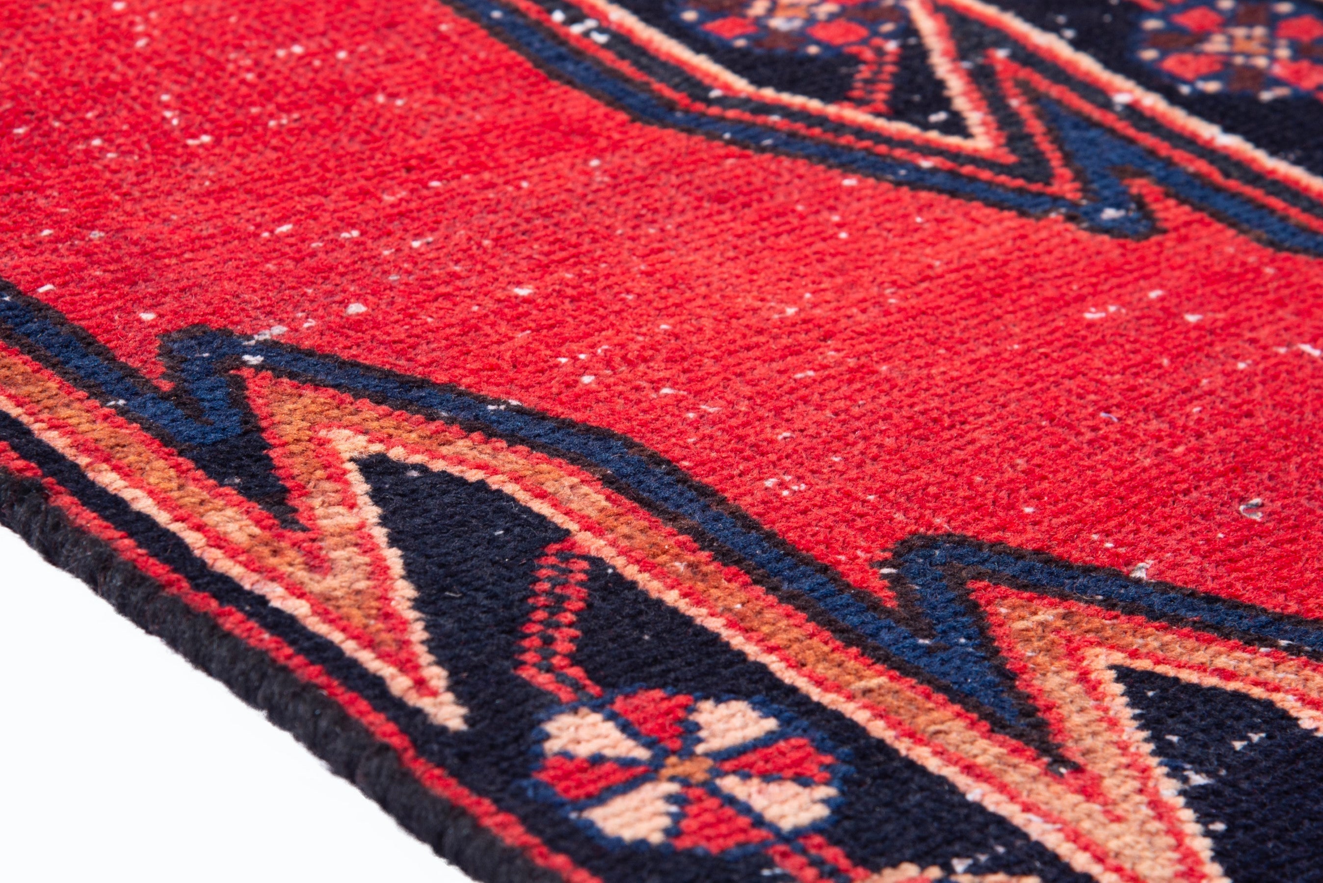 Persian Saveh accent rug in deep red and navy, view 8 of 17