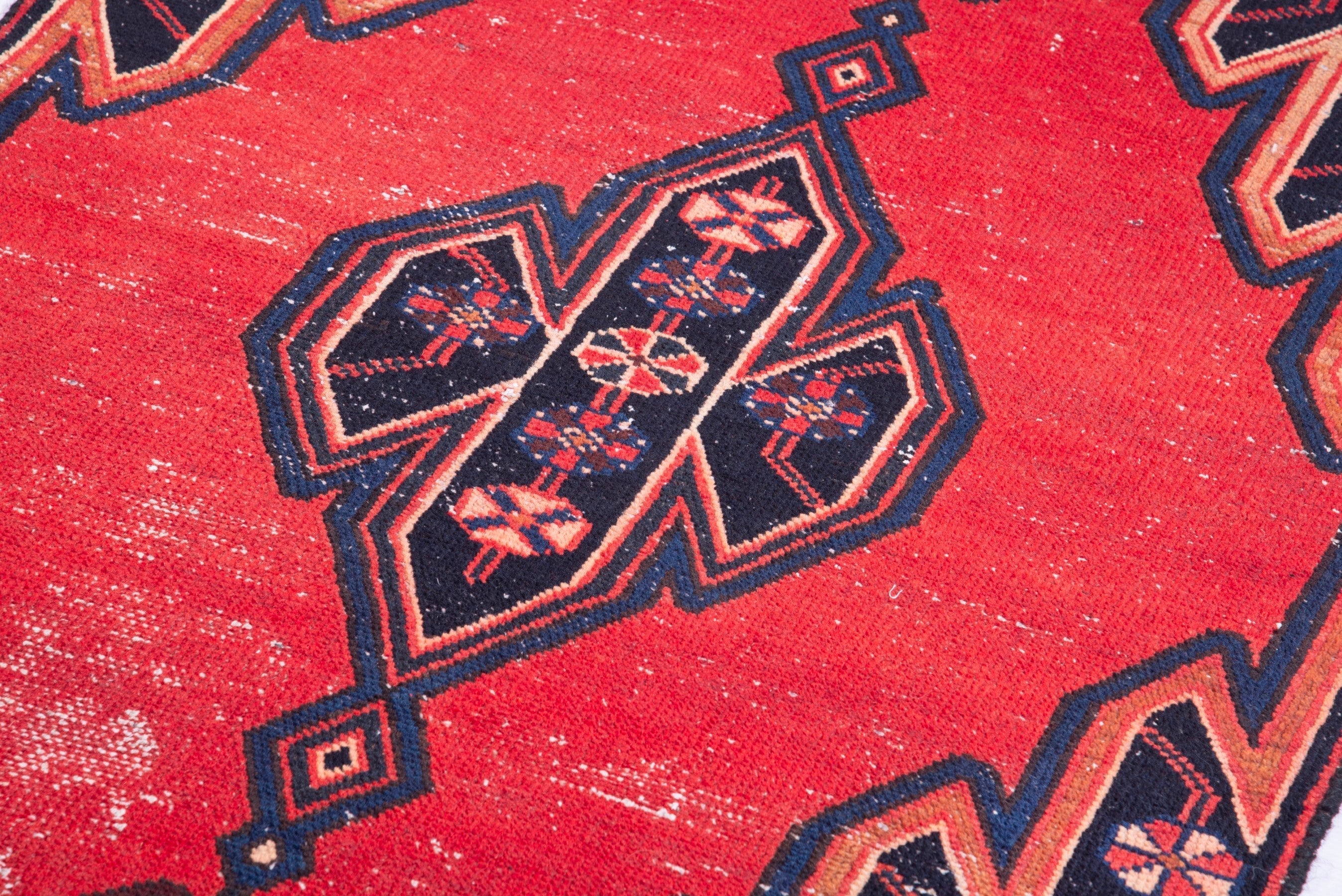 Persian Saveh accent rug in deep red and navy, view 10 of 17