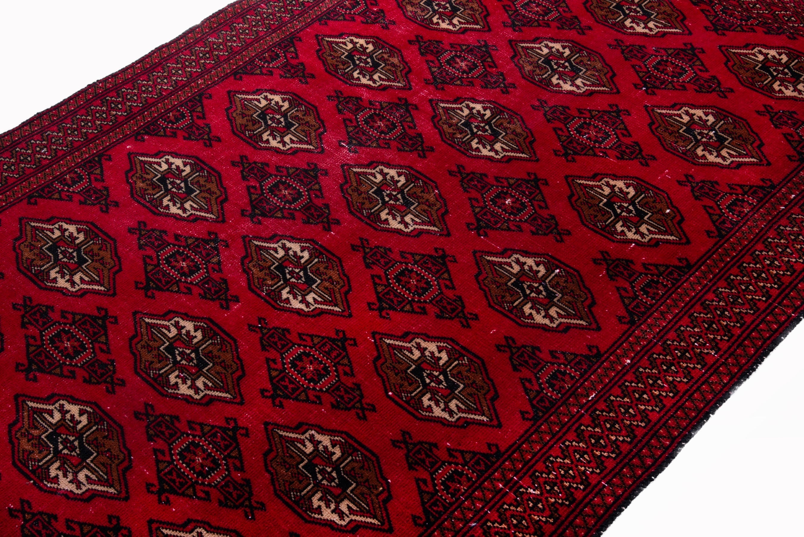 Persian Torkaman accent rug in deep red and antique gold, view 4 of 17