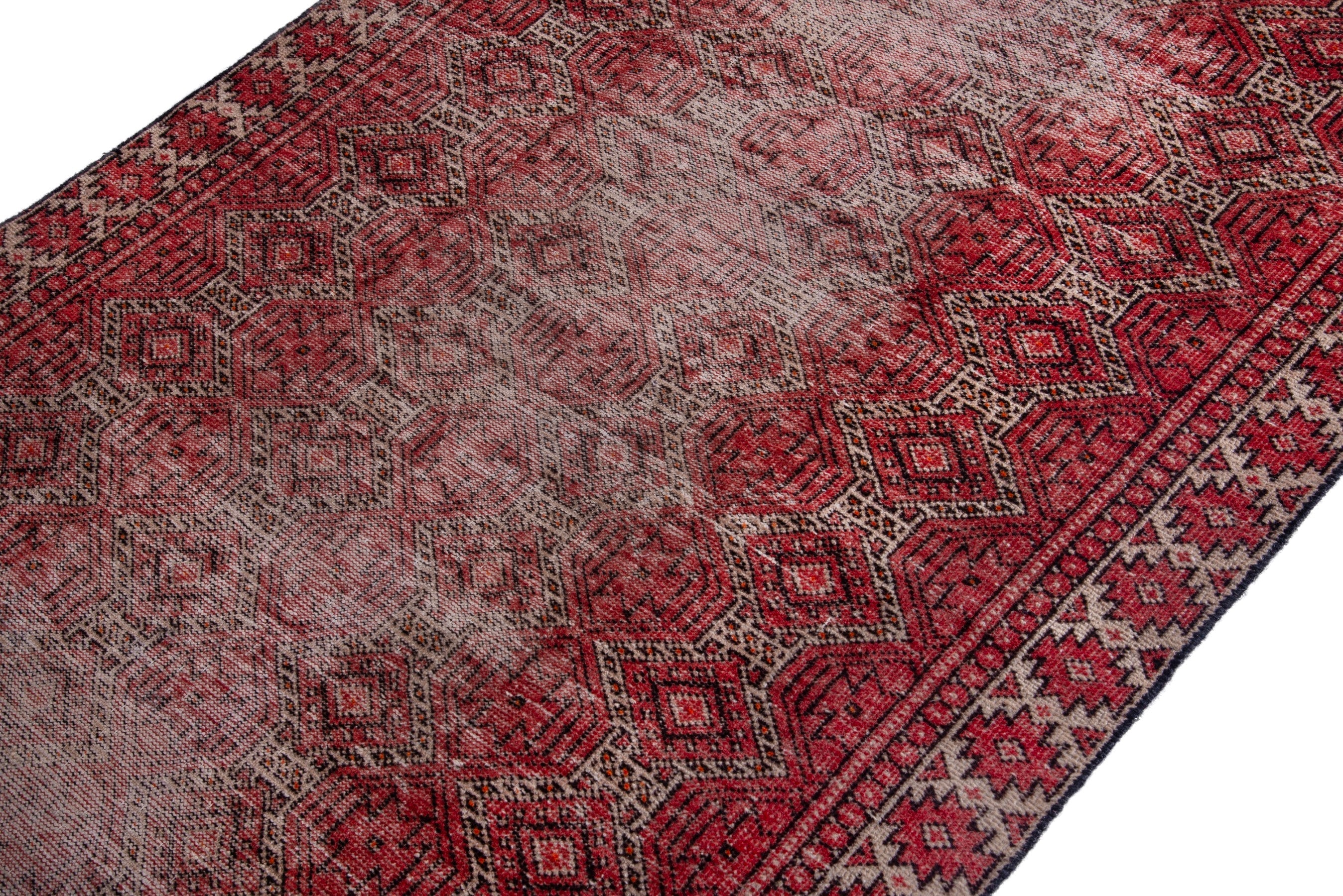 Persian Baluch accent rug in faded red and burgundy, view 6 of 16