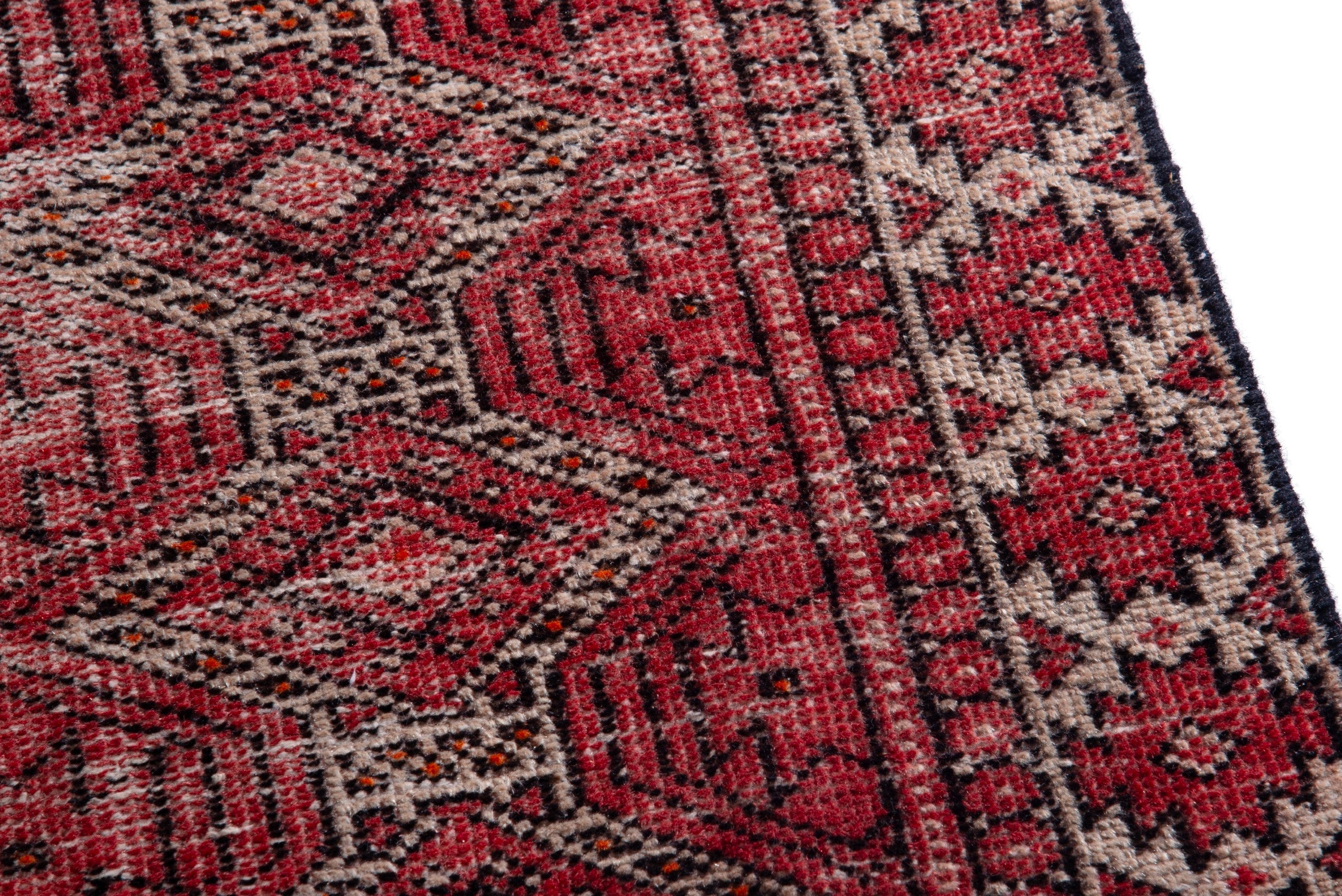 Persian Baluch accent rug in faded red and burgundy, view 7 of 16