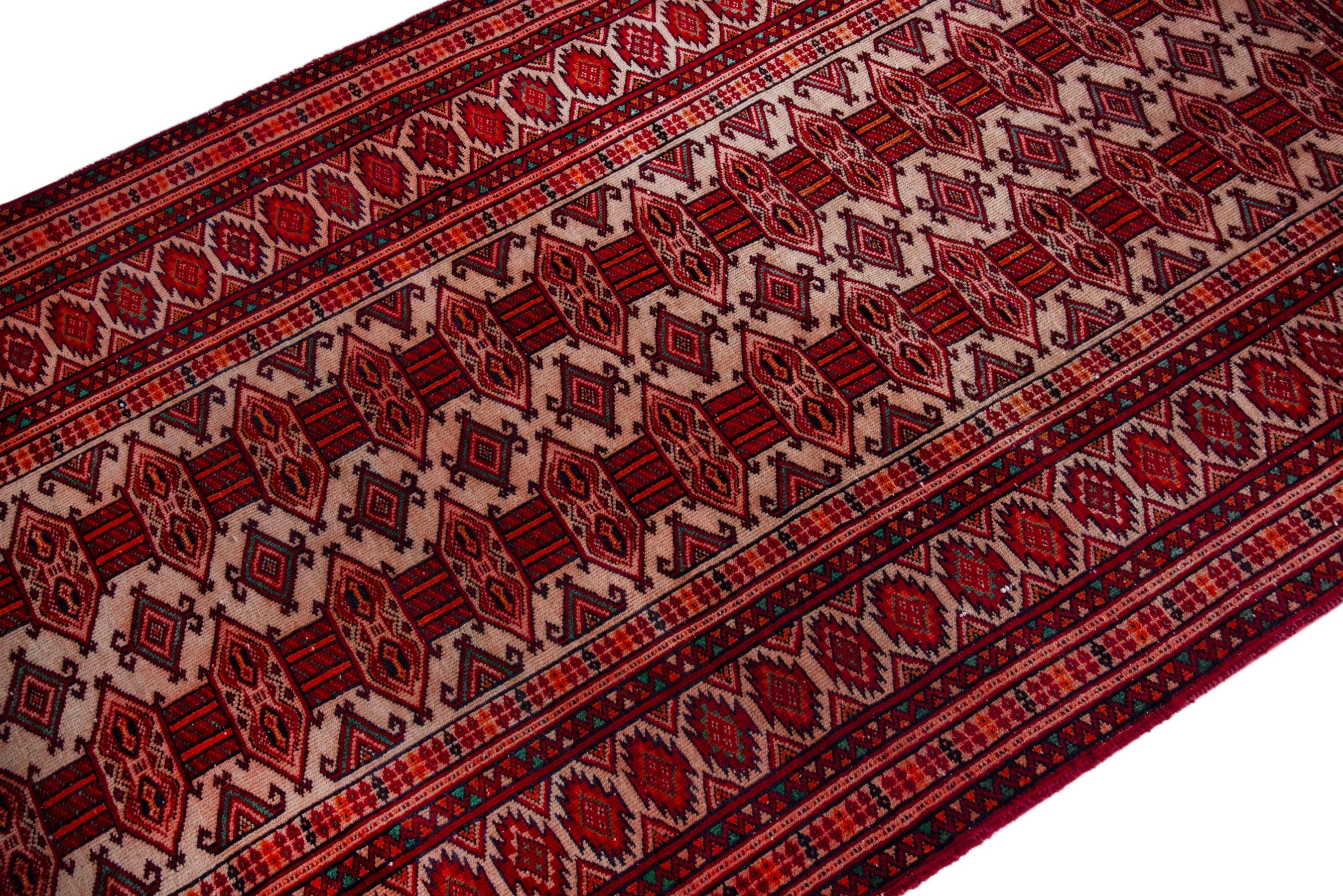 Persian Baluch accent rug in burgundy and cream, view 6 of 16
